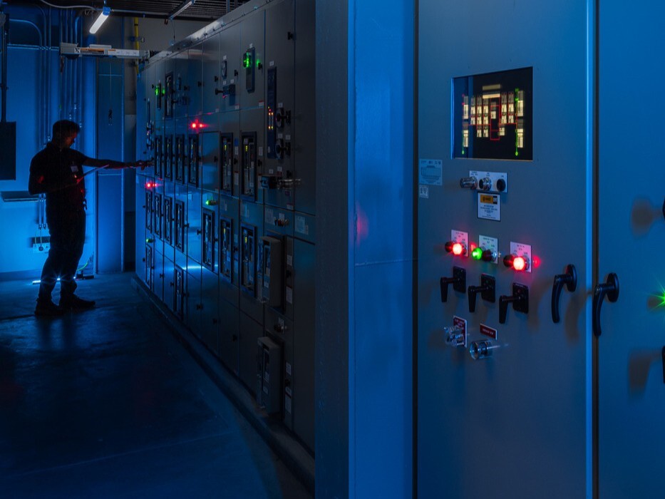 mission critical data center control panel in blue lit room