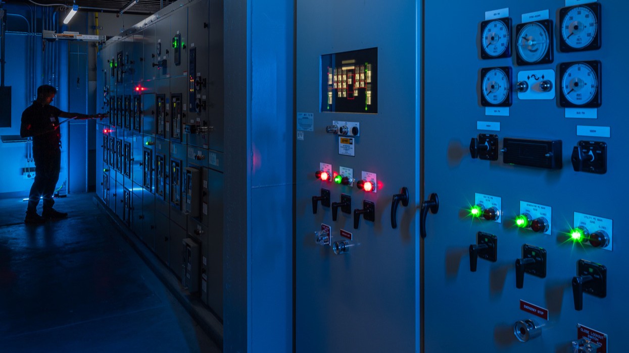 mission critical data center control panel in blue lit room