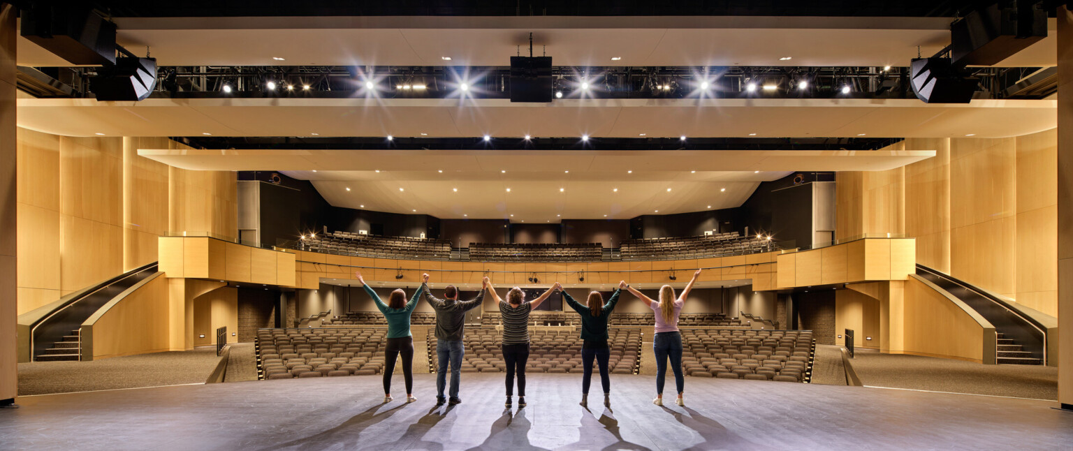 High school auditorium with students on stage