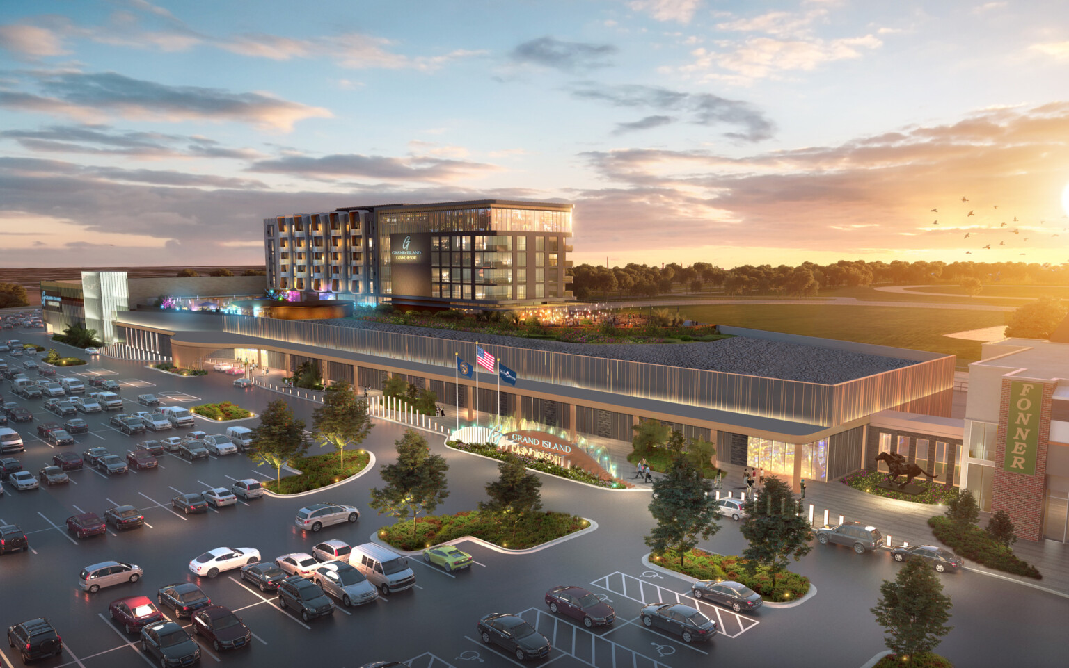 Rendering of a multi-story hotel with bright lights, sunny sky, and parking lot filled with cars