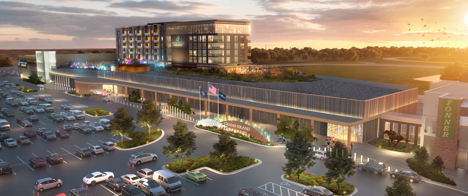 Rendering of a multi-story hotel with bright lights, sunny sky, and parking lot filled with cars