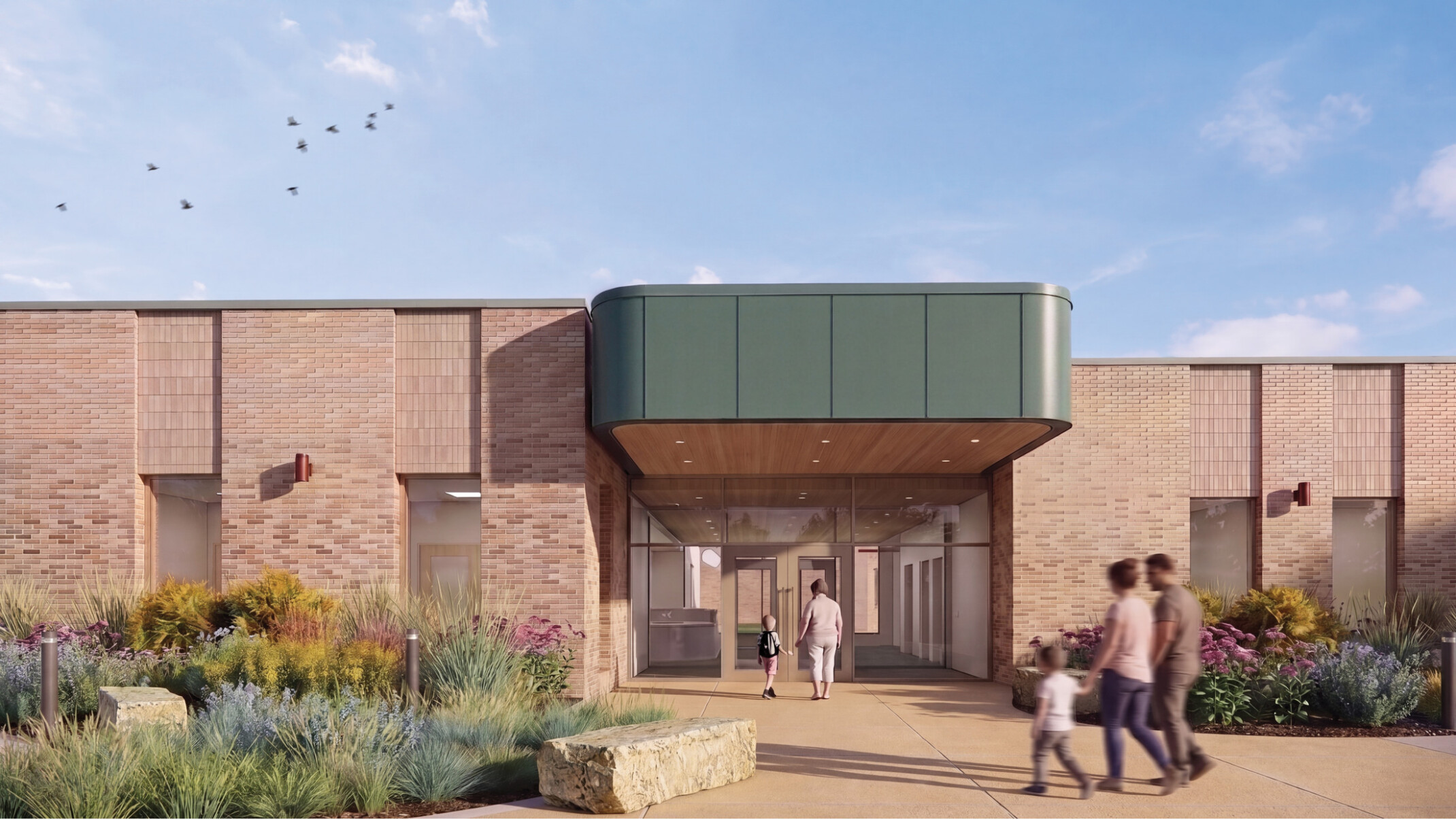 exterior rendering of a modern school building; one level light brick against a green awning entrance