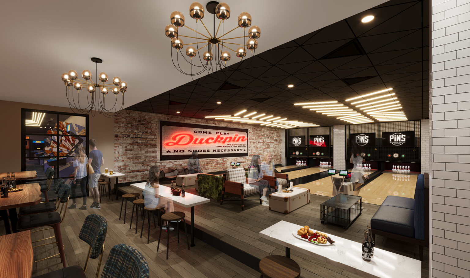 Bowling alley with red neon sign, black couches, tabletop area with wooden chairs.