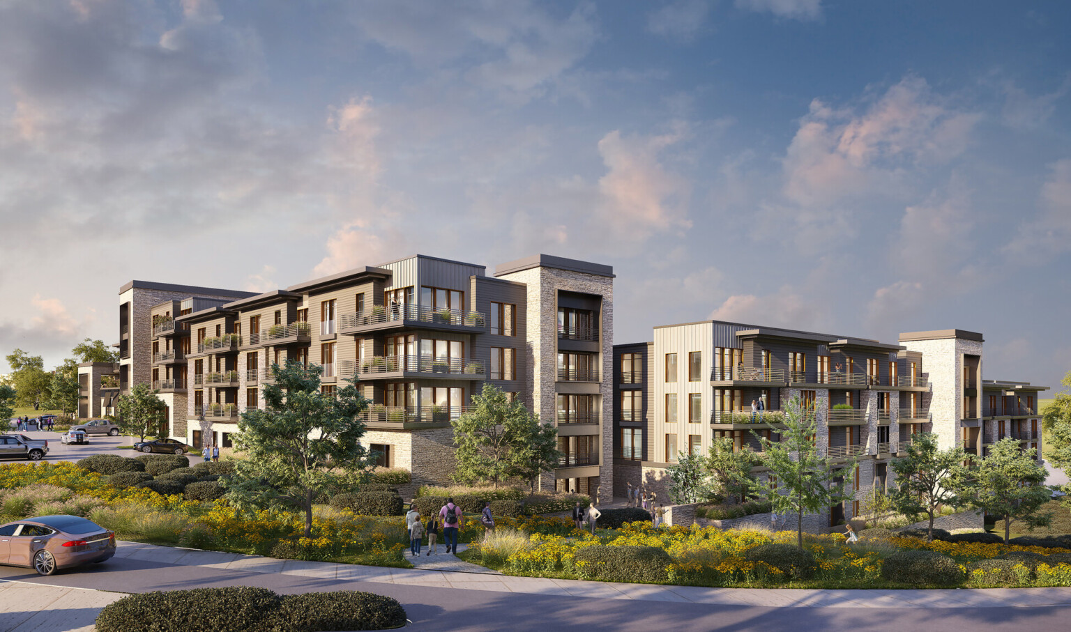 Architectural rendering of The Rocks mixed-use development in Kansas; multi-facade building with residential units throughout; lush green space in the forefront
