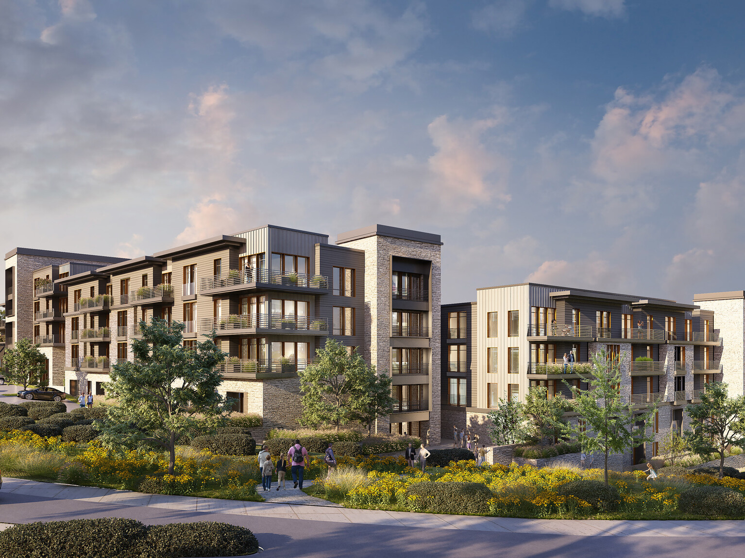 Architectural rendering of The Rocks mixed-use development in Kansas; multi-facade building with residential units throughout; lush green space in the forefront