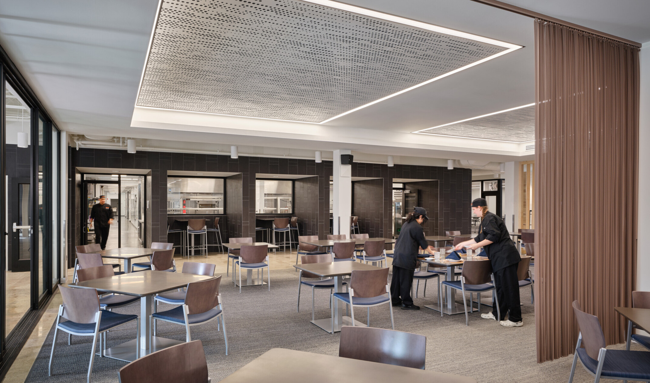 cafe in the olathe innovation center; modern open layout with many tables and chairs