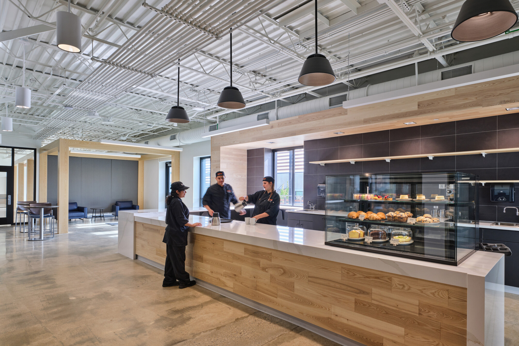 cafe in the olathe innovation center; modern barista bar with pastry case
