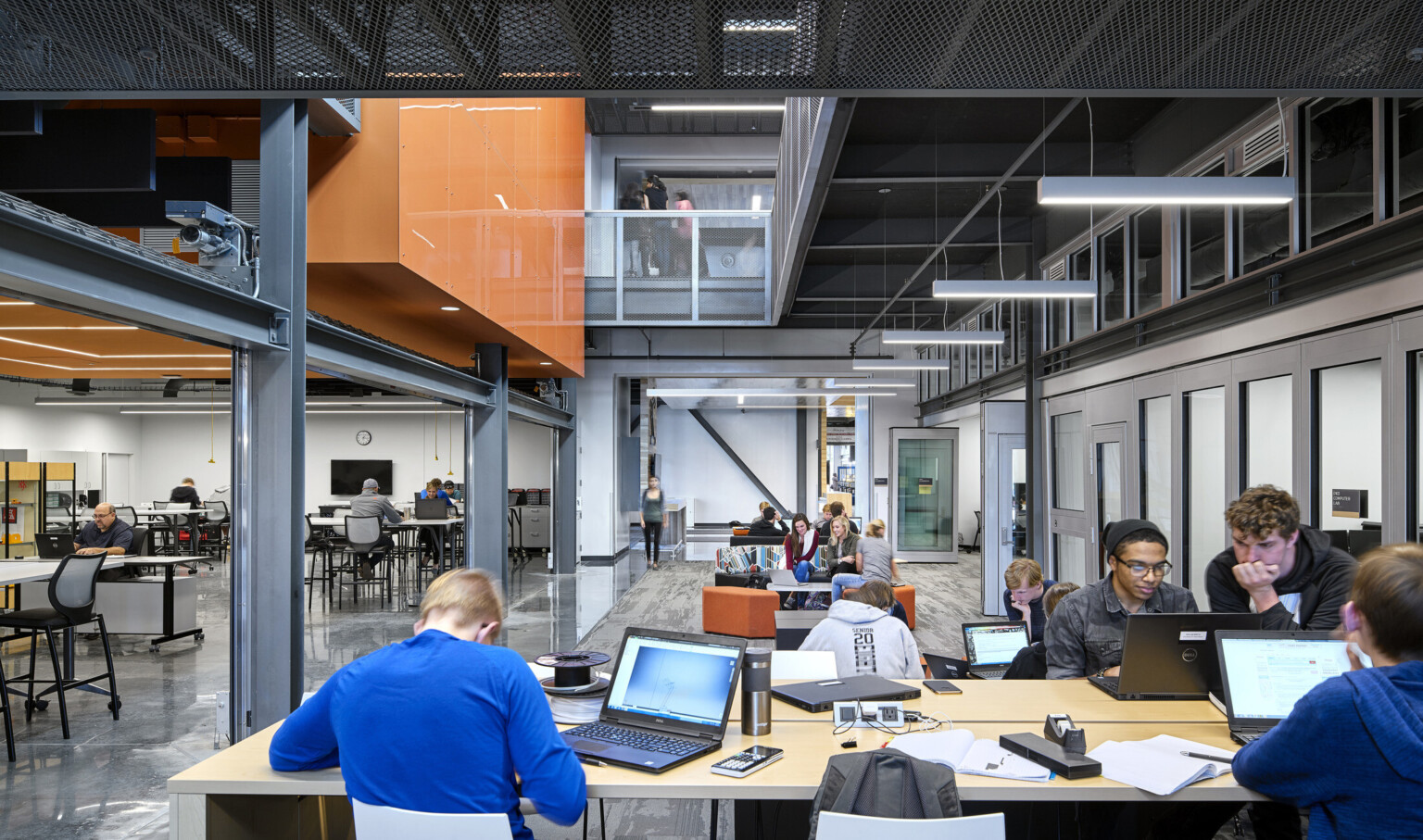 students collaborating in common space with exposed structure and views up to the second floor at the missouri innovation campus students collaborating in common space with exposed structure and views up to the second floor at the missouri innovation campus
