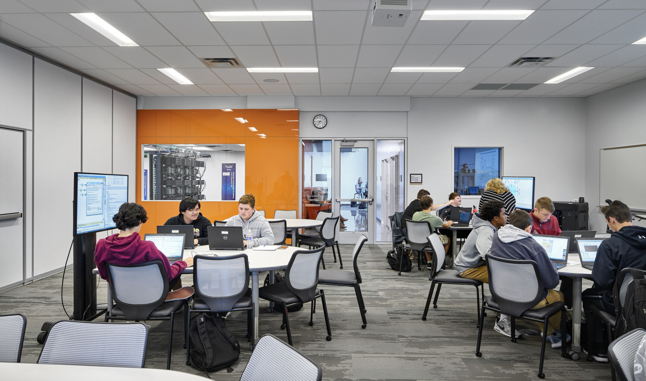 technology learning classroom with pods, screen, and flexible seating at the missouri innovation campus