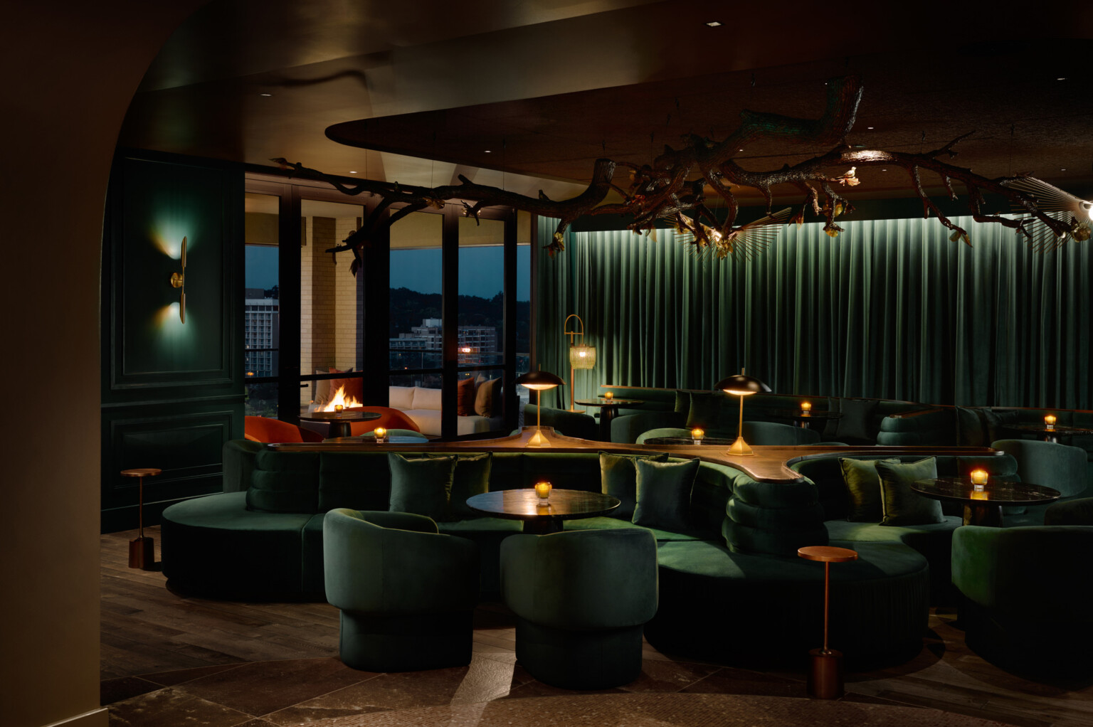 hotel bar, dark green suede furniture fills the dark and moody interior space, Cascade Hotel, A Tribute Portfolio by Marriott