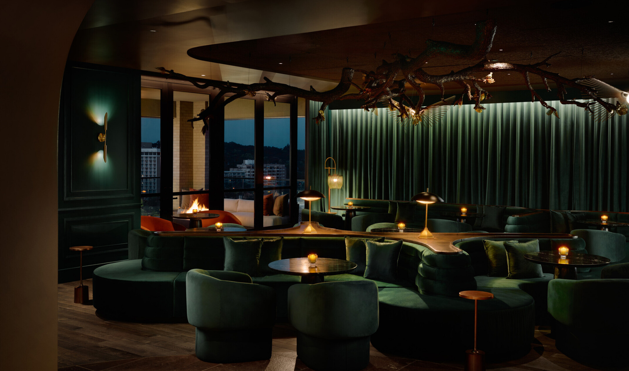 hotel bar, dark green suede furniture fills the dark and moody interior space, Cascade Hotel, A Tribute Portfolio by Marriott