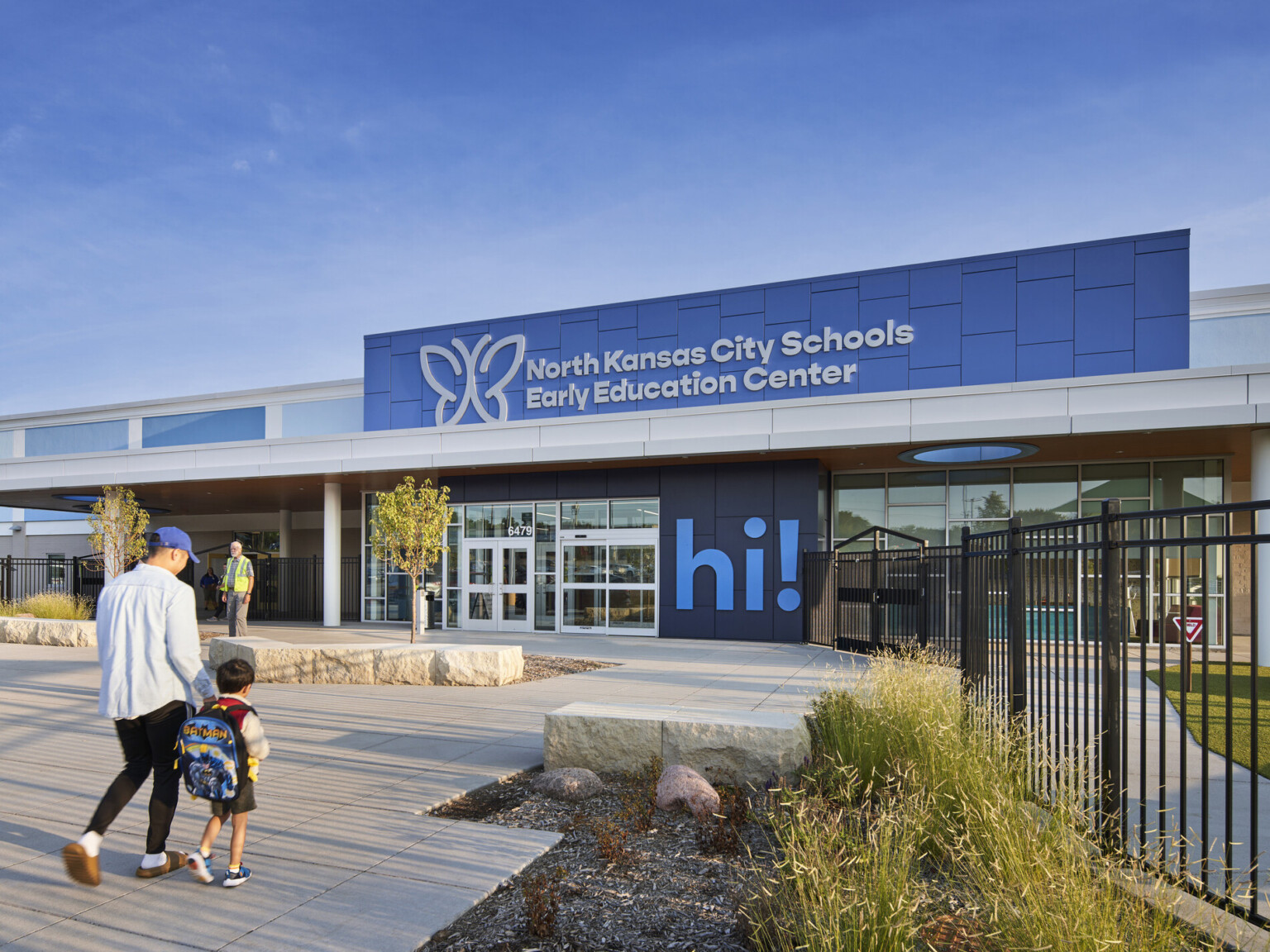 North Kansas City School Early Education Center exterior, a two tone blue facade, large "Hi!" mural by entry North Kansas City School Early Education Center exterior, a two tone blue facade, large "Hi!" mural by entry