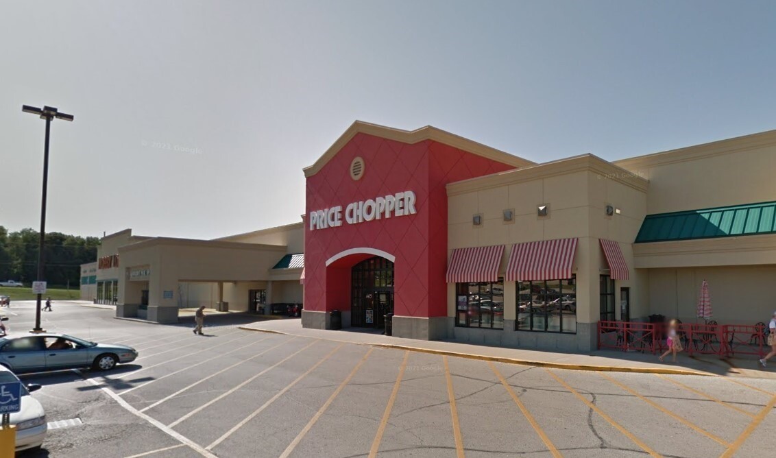 The location of NKC ECC prior to opening. An abandoned grocery store. Dark red building with pointed center facade