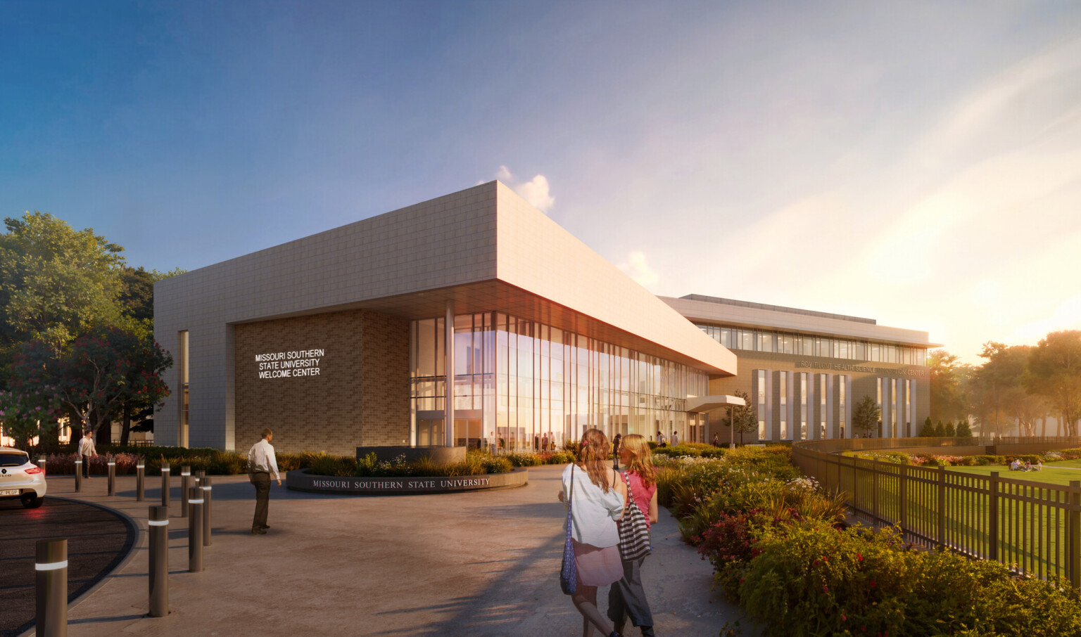 Modern university building with sleek glass walls and warm stone exteriors, labeled Missouri Southern State University Welcome Center. Modern university building with sleek glass walls and warm stone exteriors, labeled Missouri Southern State University Welcome Center.