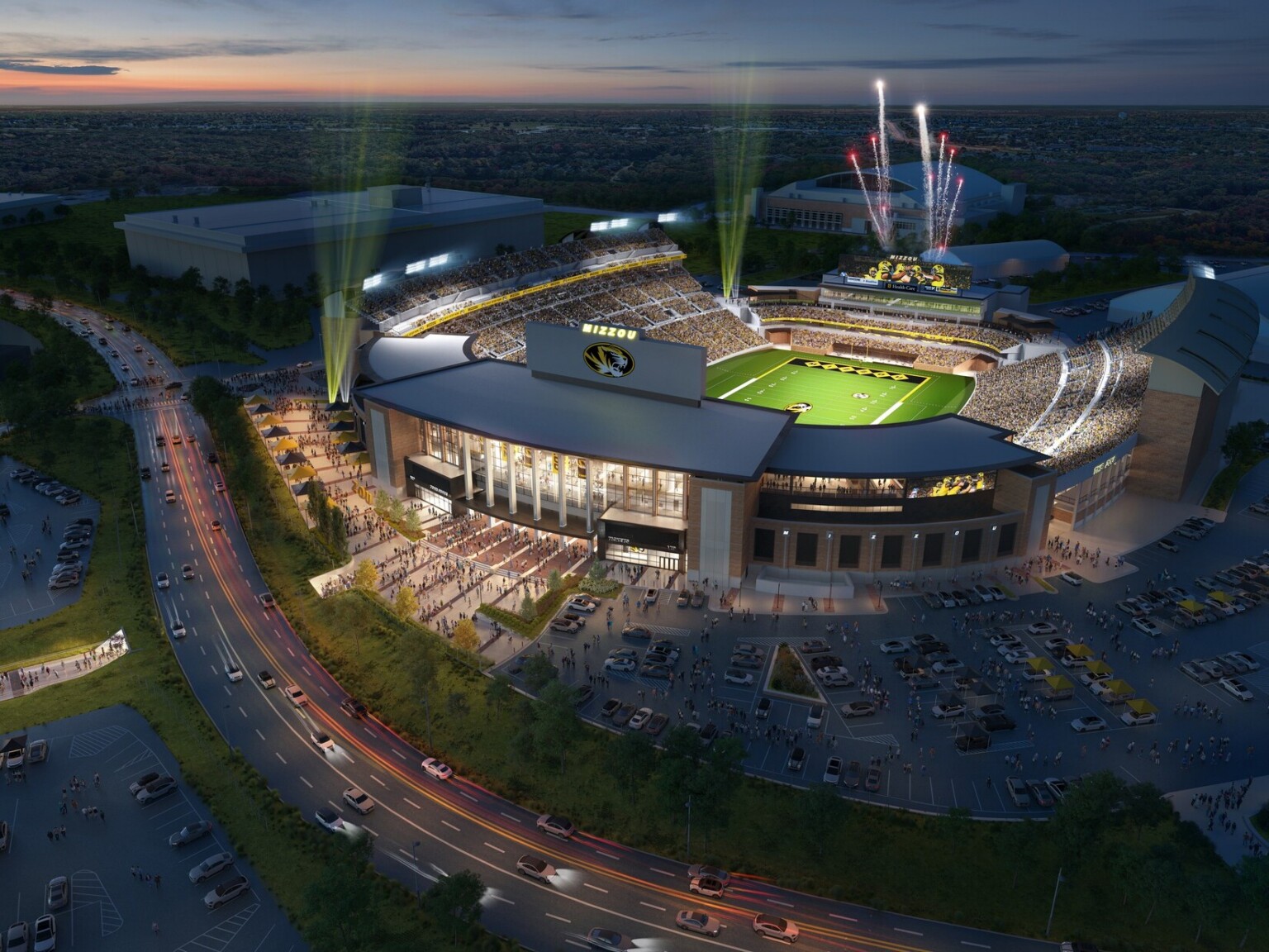 aerial rendering of University of Missouri Mizzou Memorial Stadium illuminated for a night game after renovation
