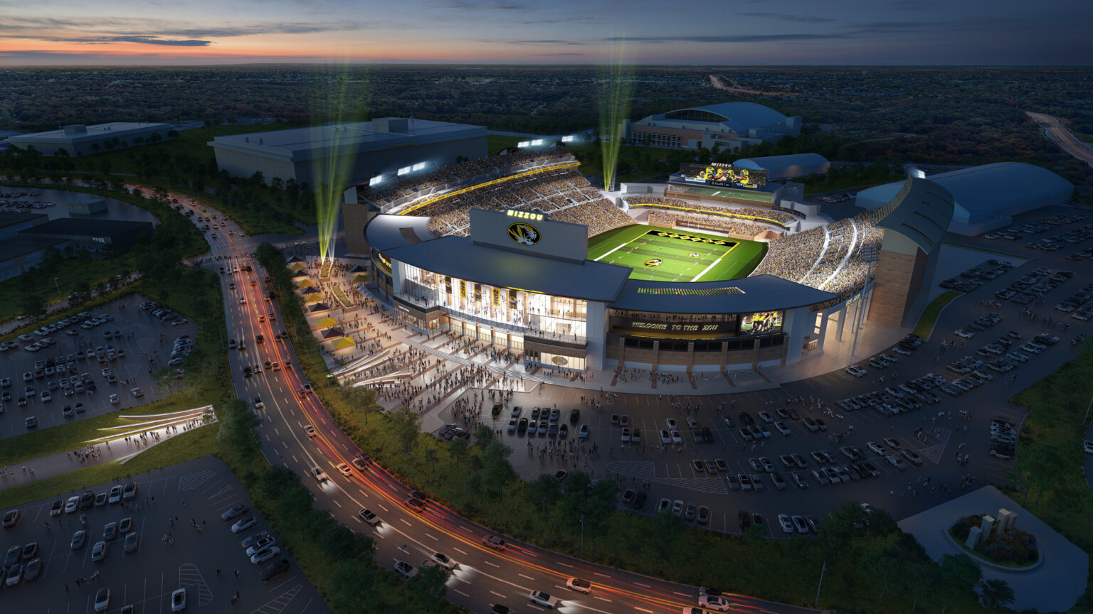 Aerial view a football stadium at night fill with light and bustling with people Aerial view a football stadium at night fill with light and bustling with people