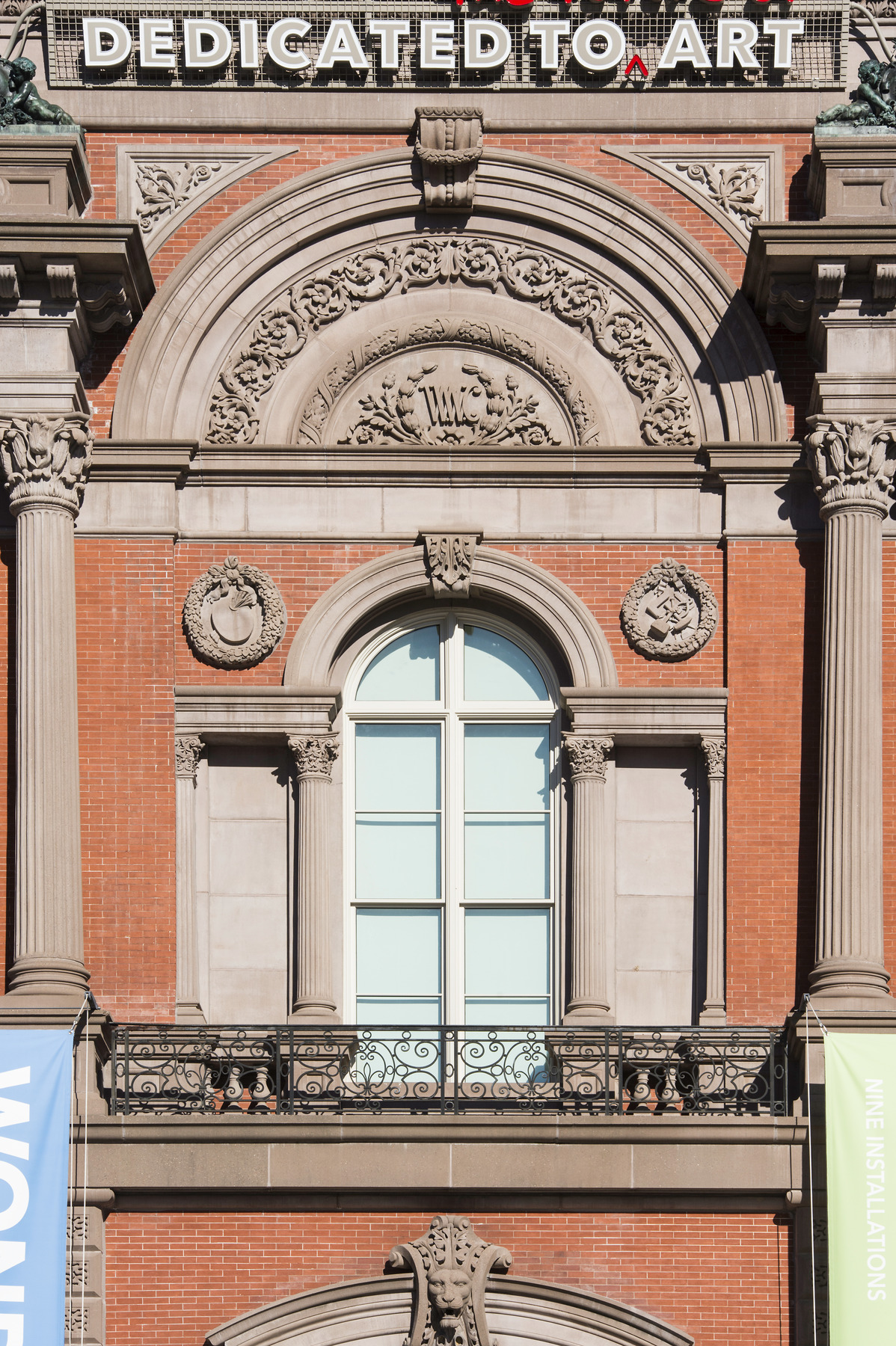 dedicated to art sign on historic facade at renwick gallery