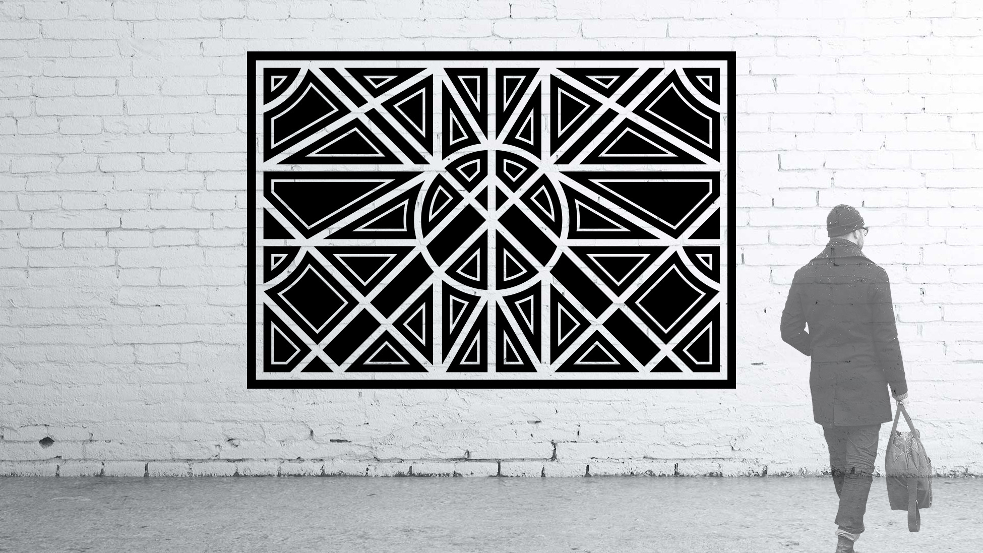 black geometric branding mural on white wall for riverpoint shopping center