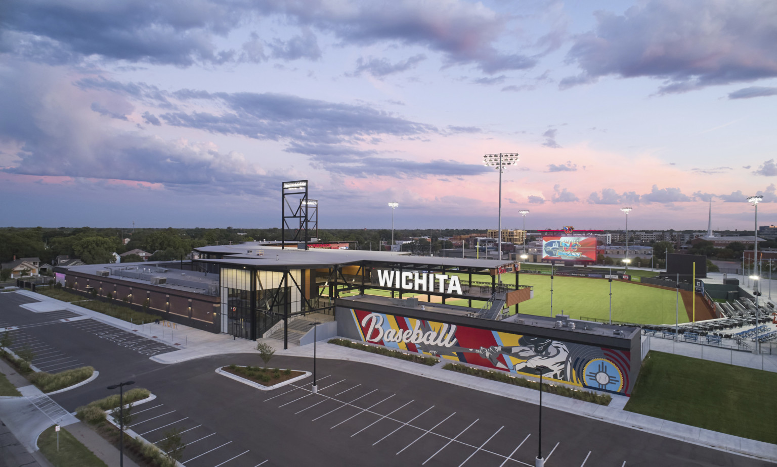 Aerial view of Riverfront Stadium seen from front entrance with colorful mural with white Wichita sign above