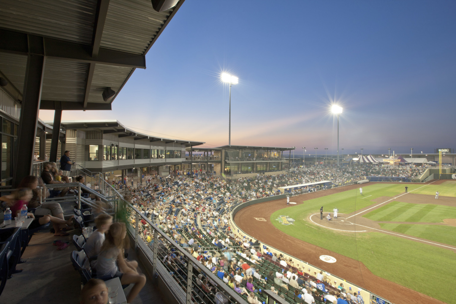 Werner Park, home of the Omaha Storm Chasers, viewed from the upper deck seating along the third baseline with stadium lights