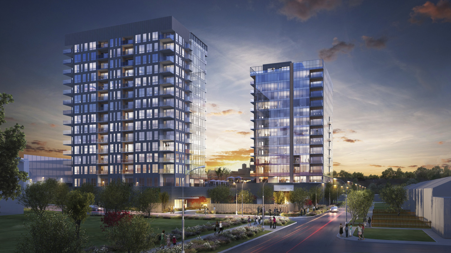 Moselle at River's Edge, 2 glass buildings with partial black wrapped facade with recessed balconies and half roof patios