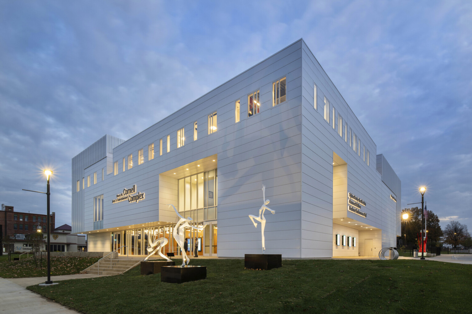 The Harry M. Cornell Arts and Entertainment Complex, a white building with recess glass, view to double height atrium