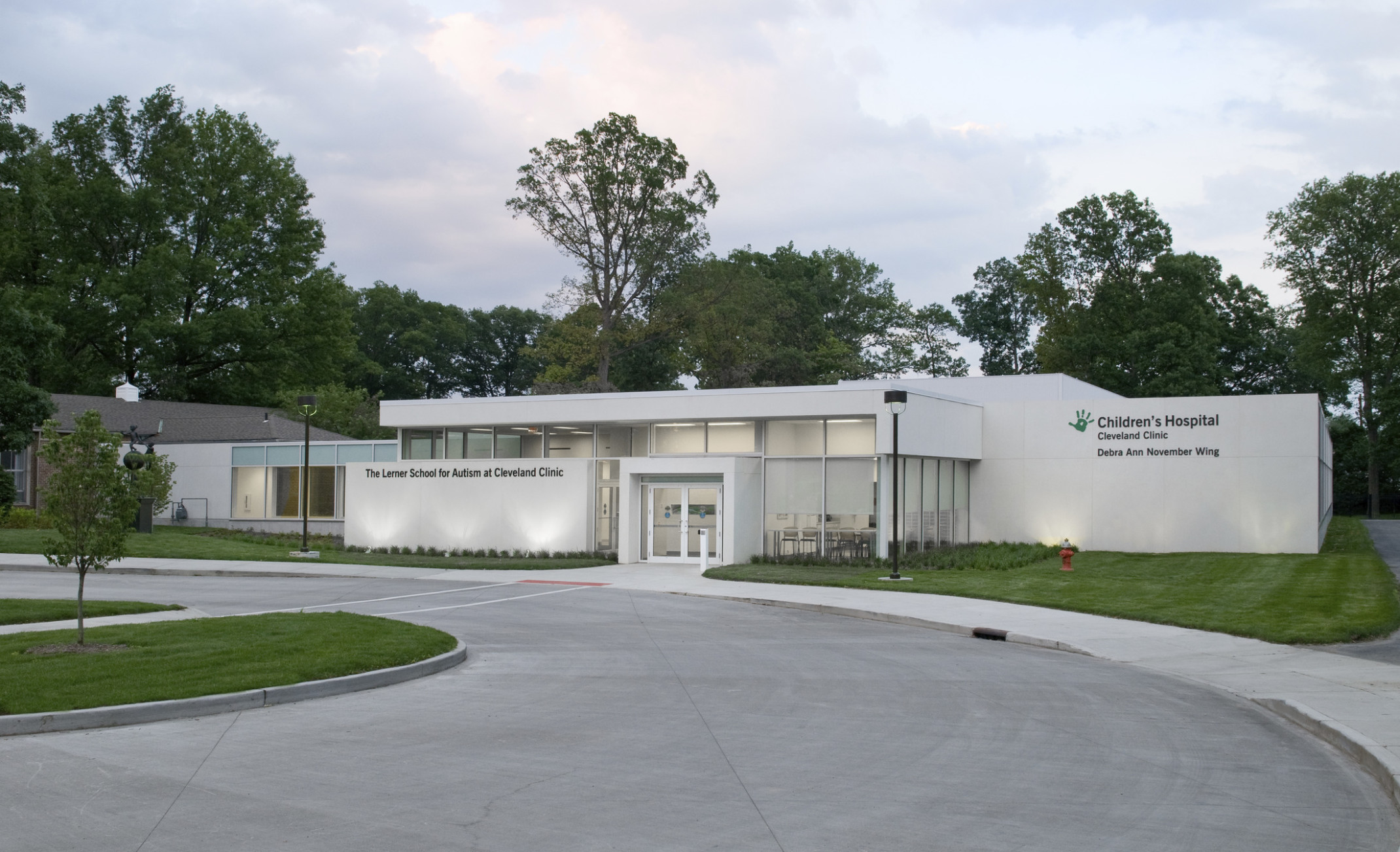 Entrance to Cleveland Clinic Lerner School for Autism, a white single story building with windows at front