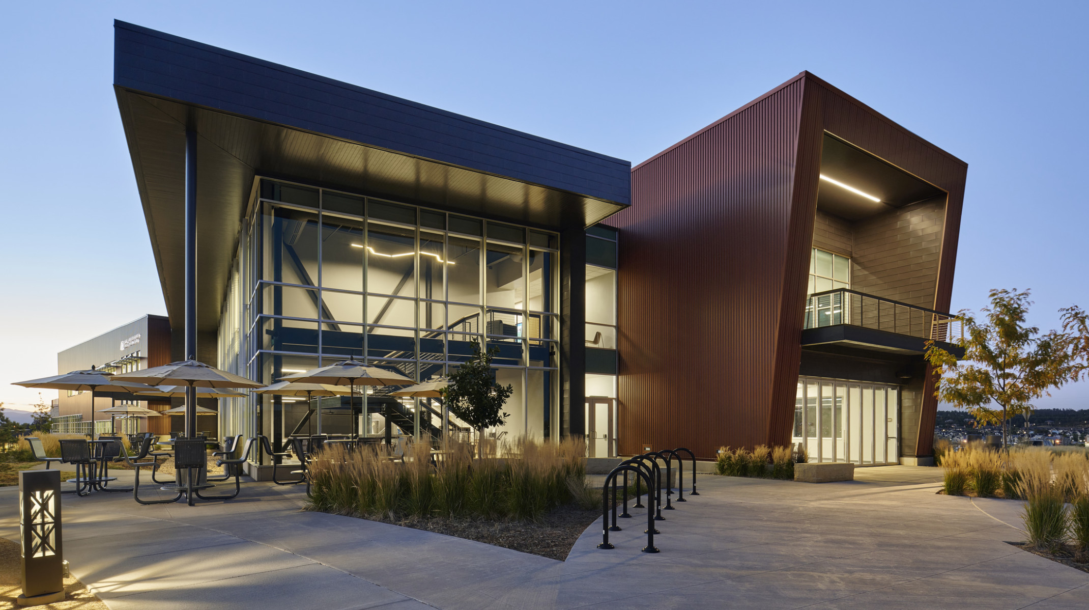 Arapahoe Community College, Sturm Collaboration Campus building with angular overhangs above illuminated glass façade