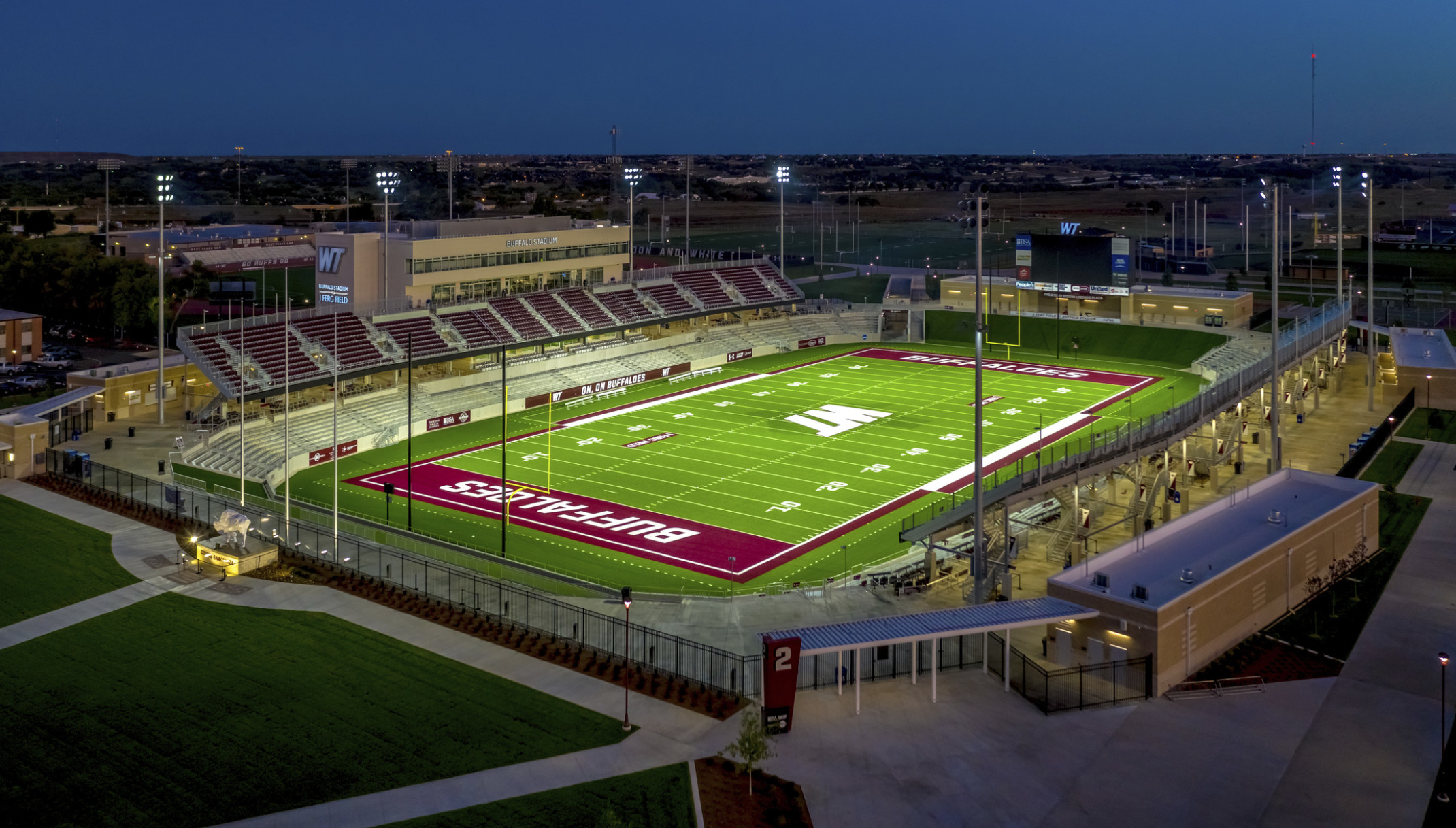 Buffalo Stadium at West Texas A&M aerial view rendering of the football field illuminated at night