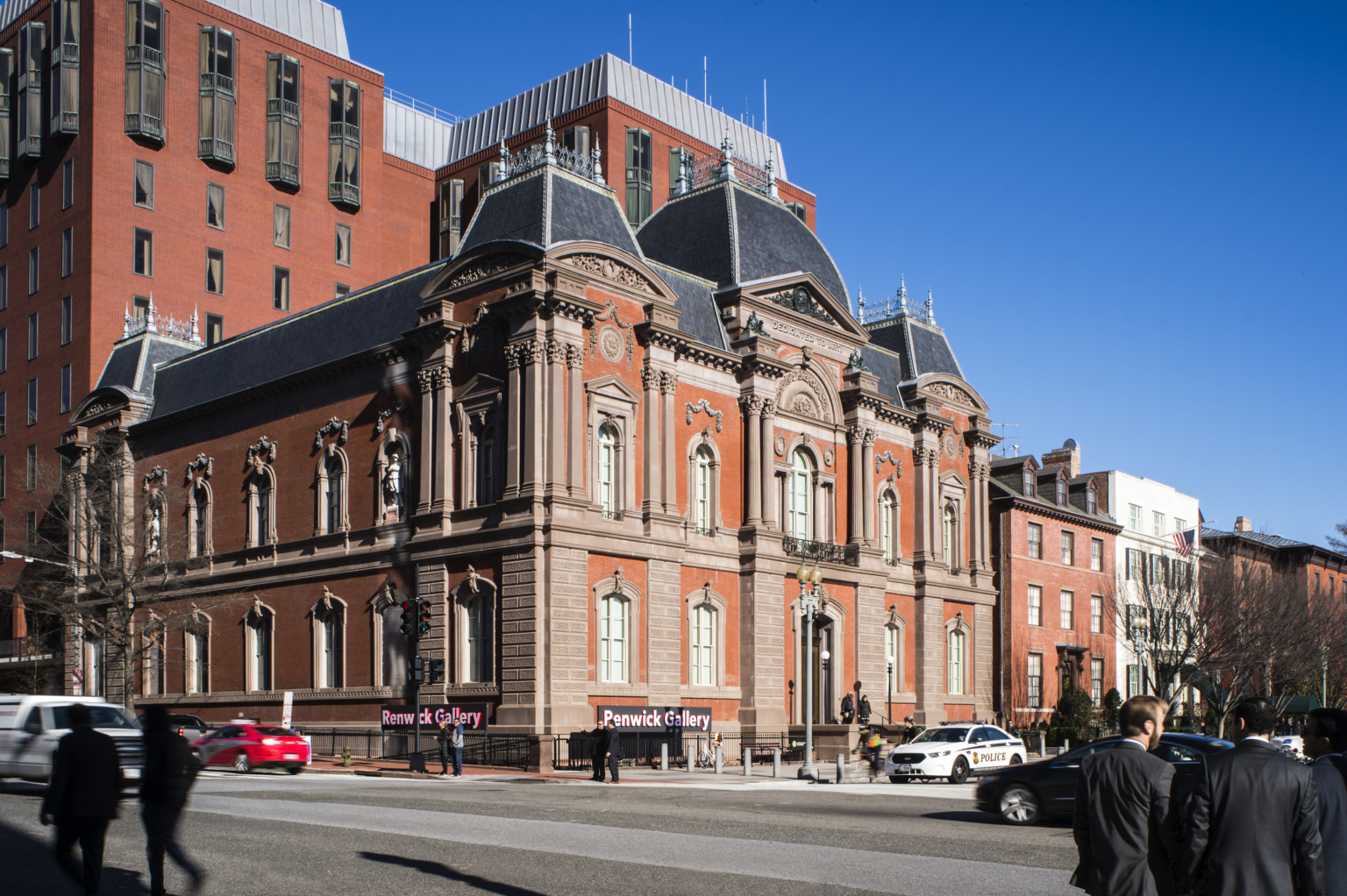 Exterior corner view of Smithsonian American Art Museum's Renwick Gallery from across a busy street