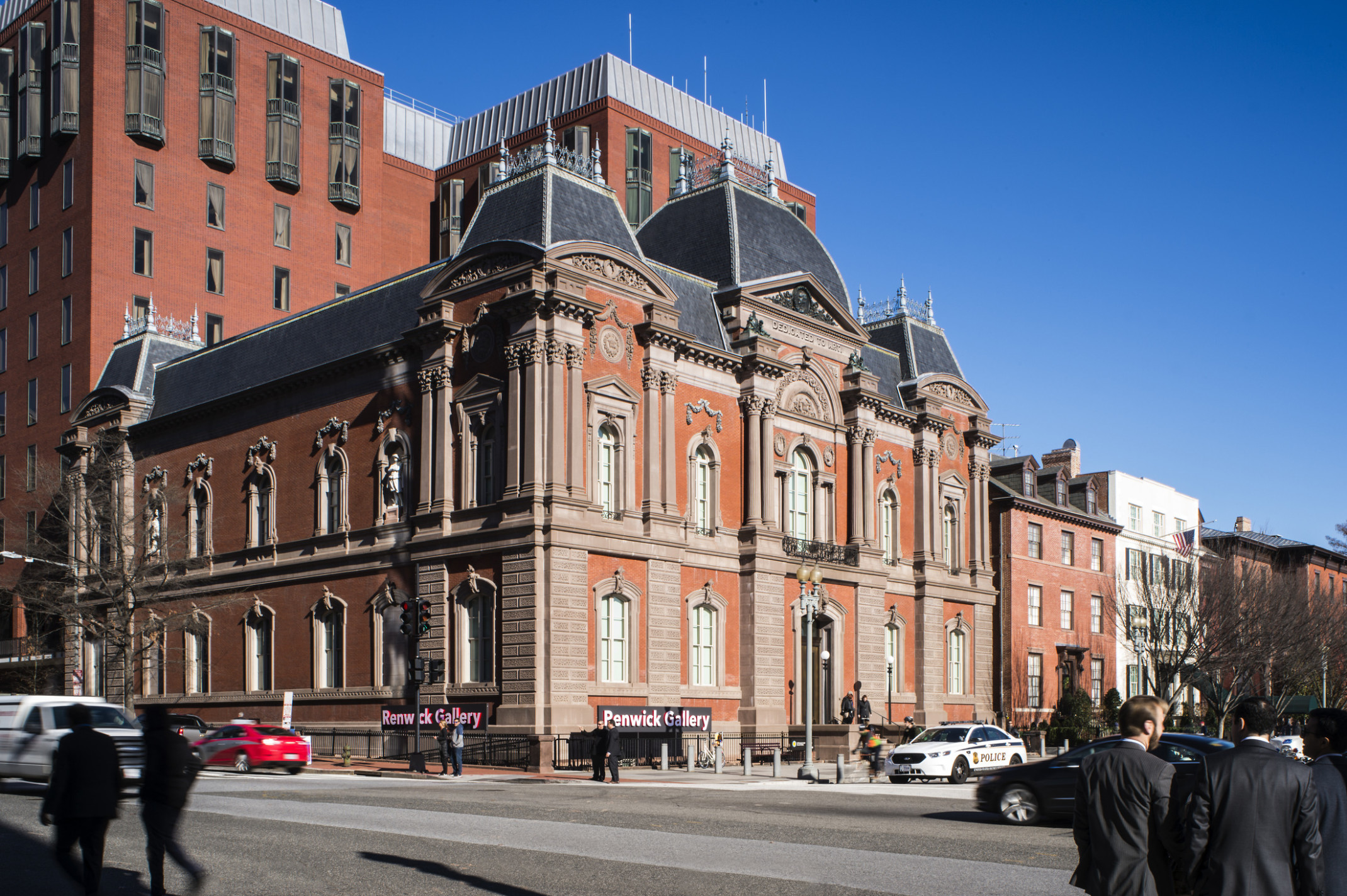 Exterior corner view of Smithsonian American Art Museum's Renwick Gallery from across a busy street Exterior corner view of Smithsonian American Art Museum's Renwick Gallery from across a busy street