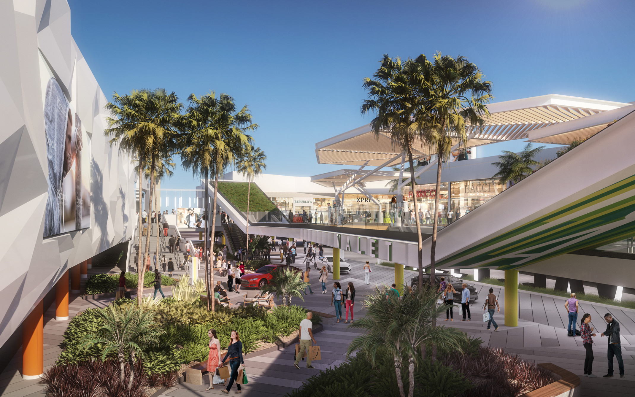 Los Angeles Premium Outlets have a large angled white valet shelter with green roof. White slat awning over path and entries