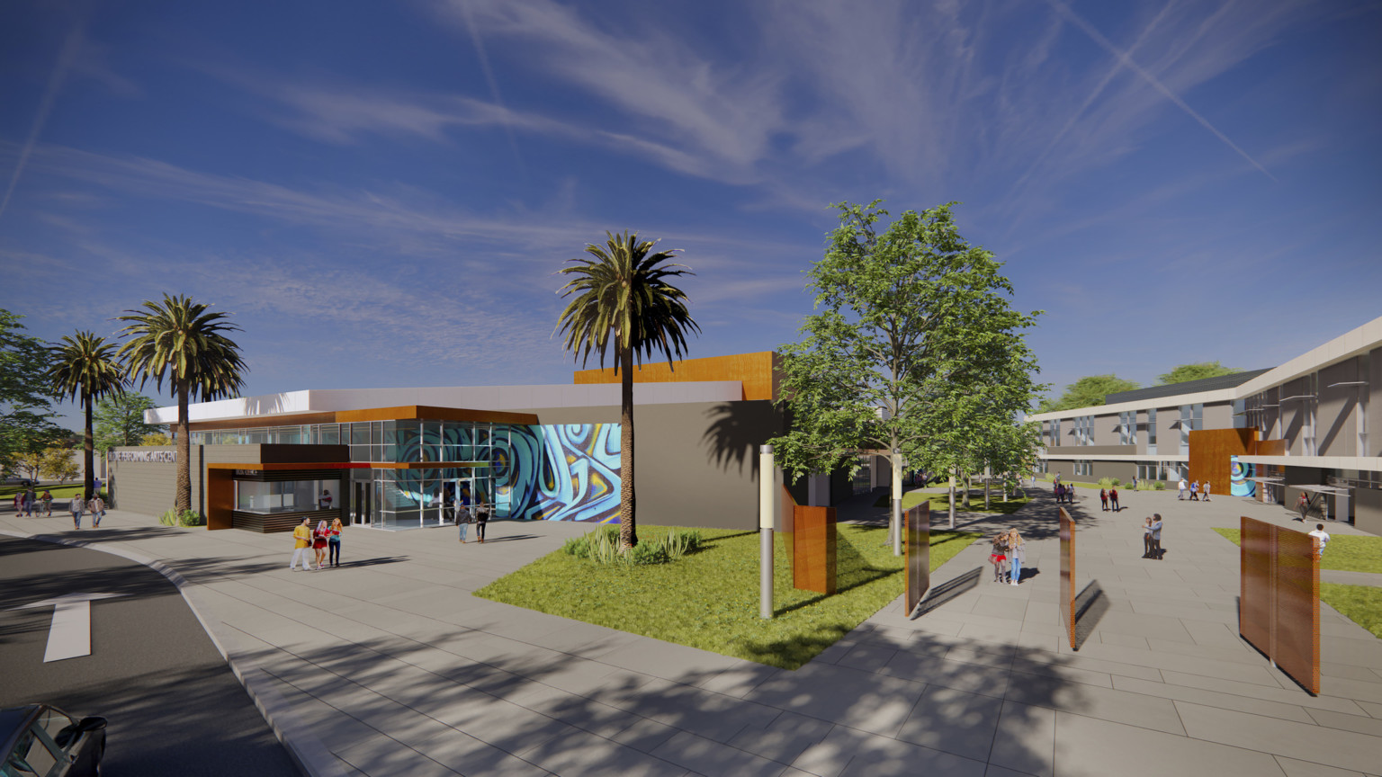 Exterior view of campus with rotating wood gate doors opened. Left, double height glass entry with mural wall detail