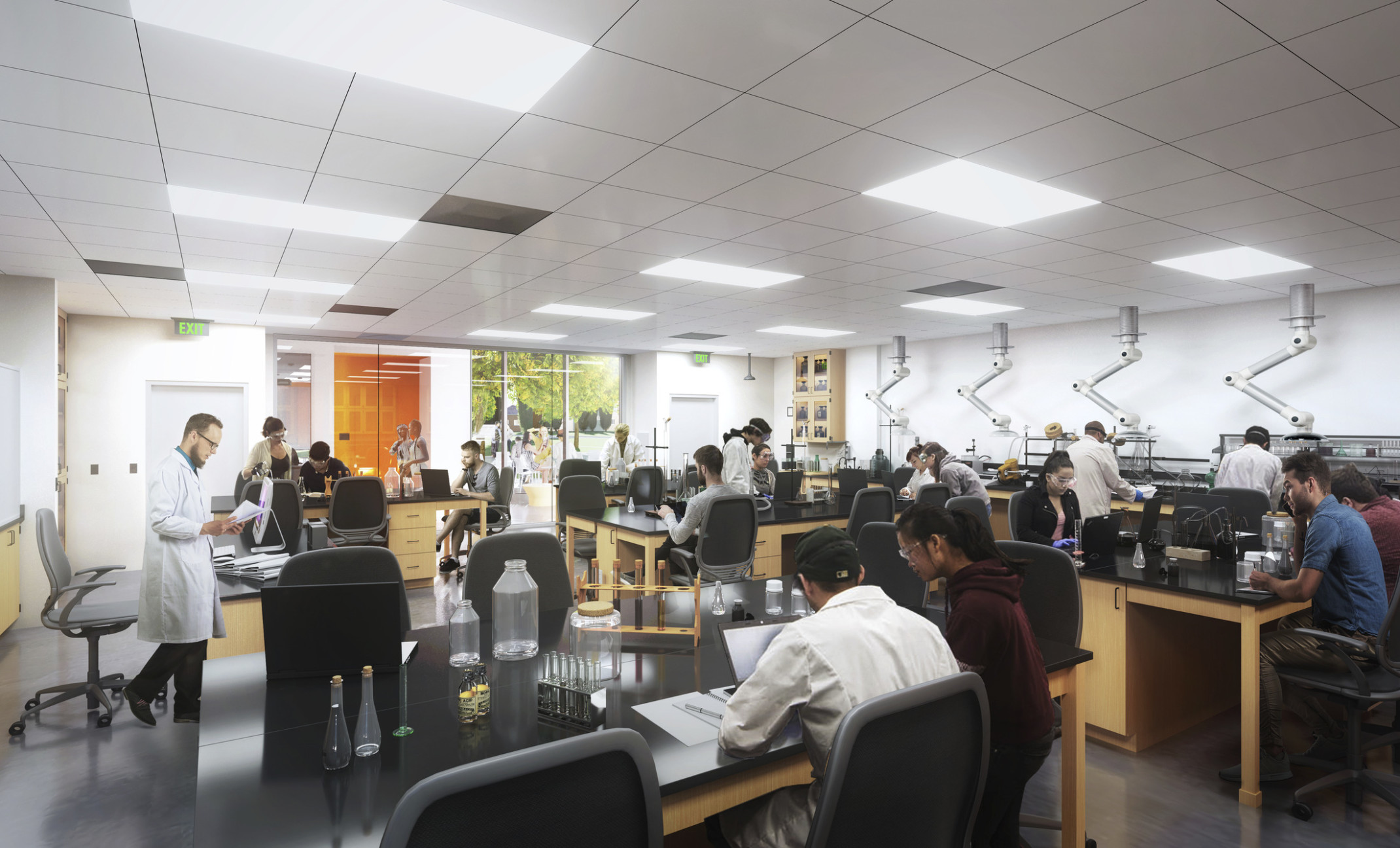 View of science lab from back of classroom. Lab tables and seating can be viewed from glass wall in hallway, opposite