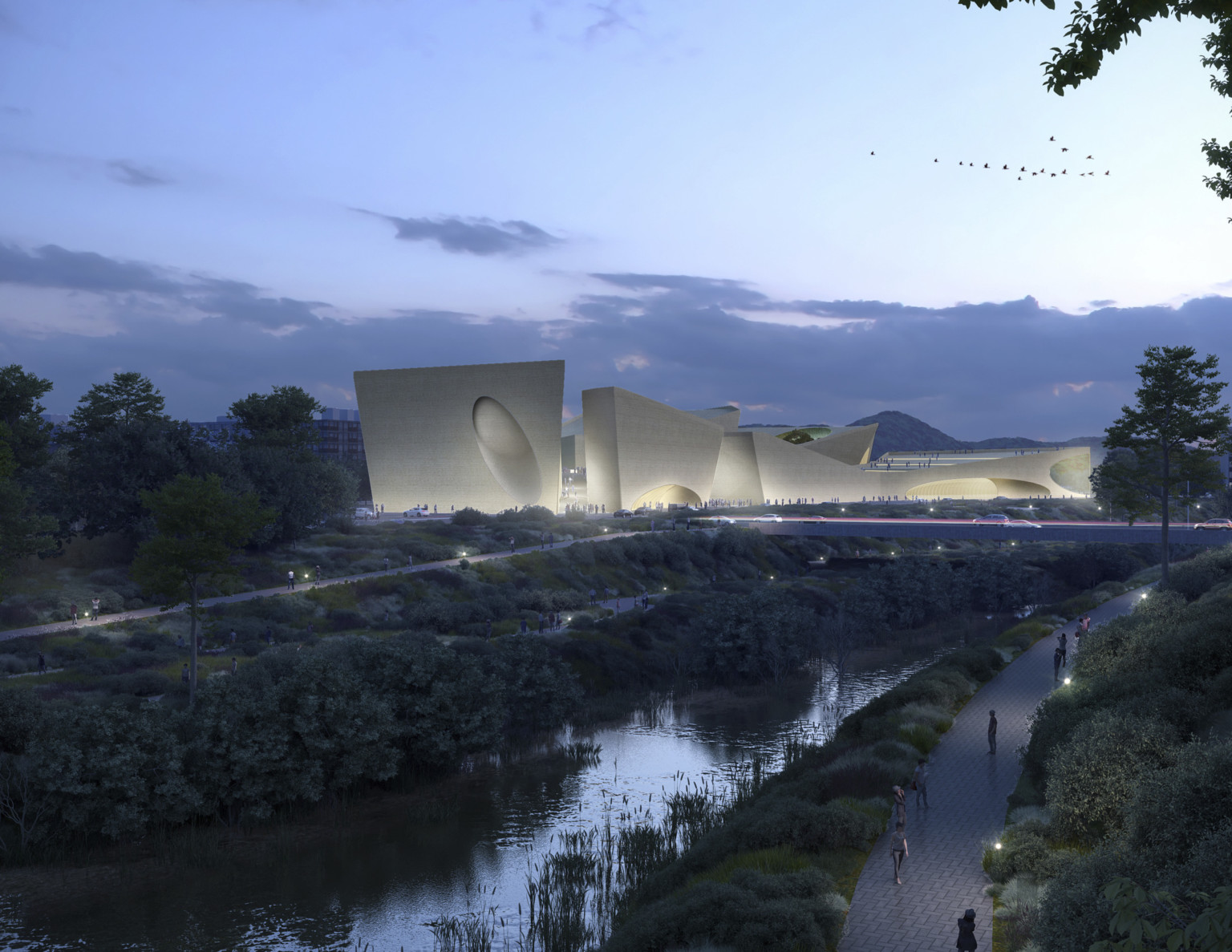 Exterior view of geometric Shenzhen Natural History Museum multibuilding site illuminated from below at night