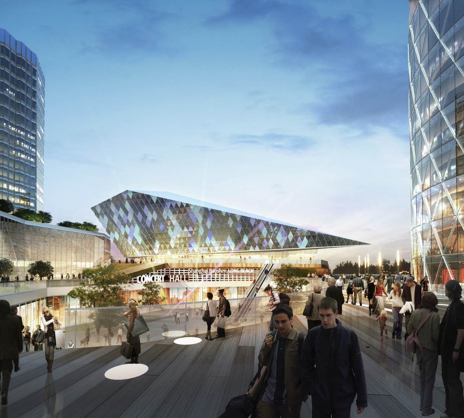 An elevated walkway above a plaza facing the concert hall, an angular, pointed building with iridescent, diamond shaped glass