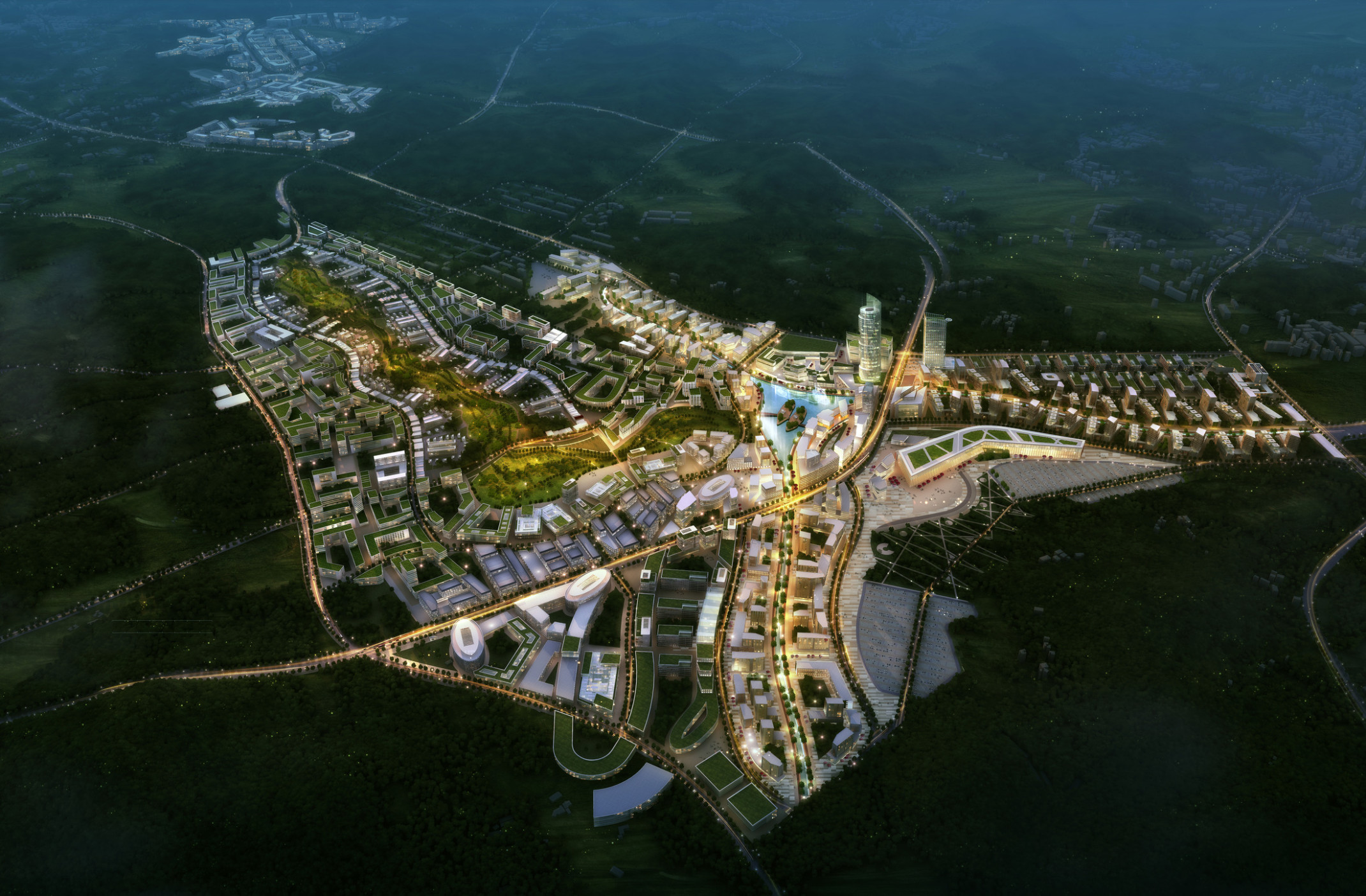 Smart City Korea illuminated at night with green roof buildings and a large park curving towards lake