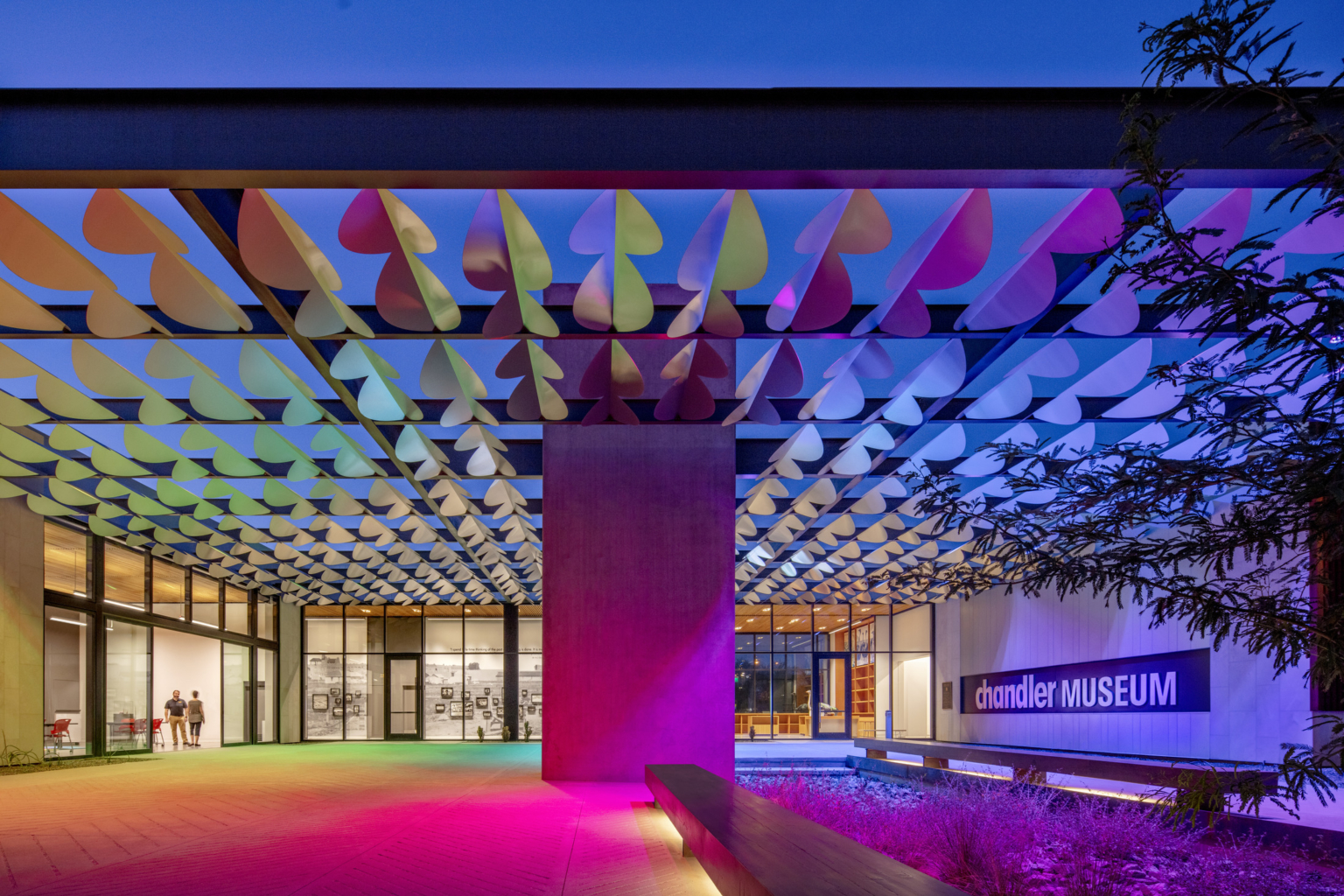 Infinite Shade at the Chandler Art Museum illuminated in multicolor array at night