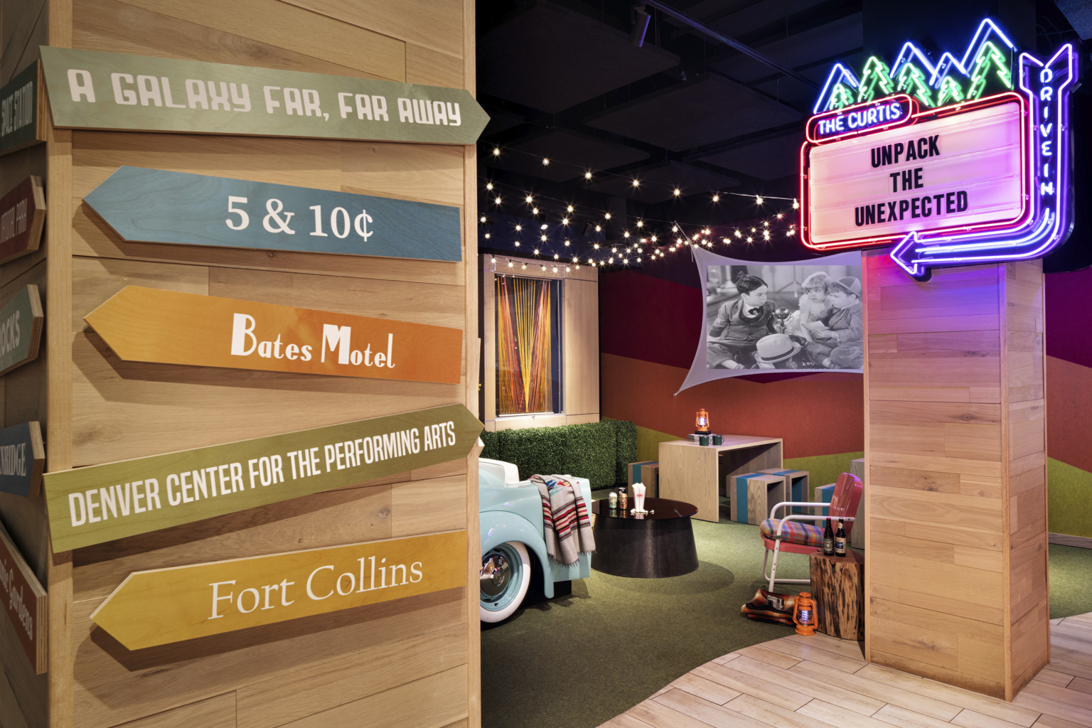 the curtis hotel lobby with pop culture references and neon signs