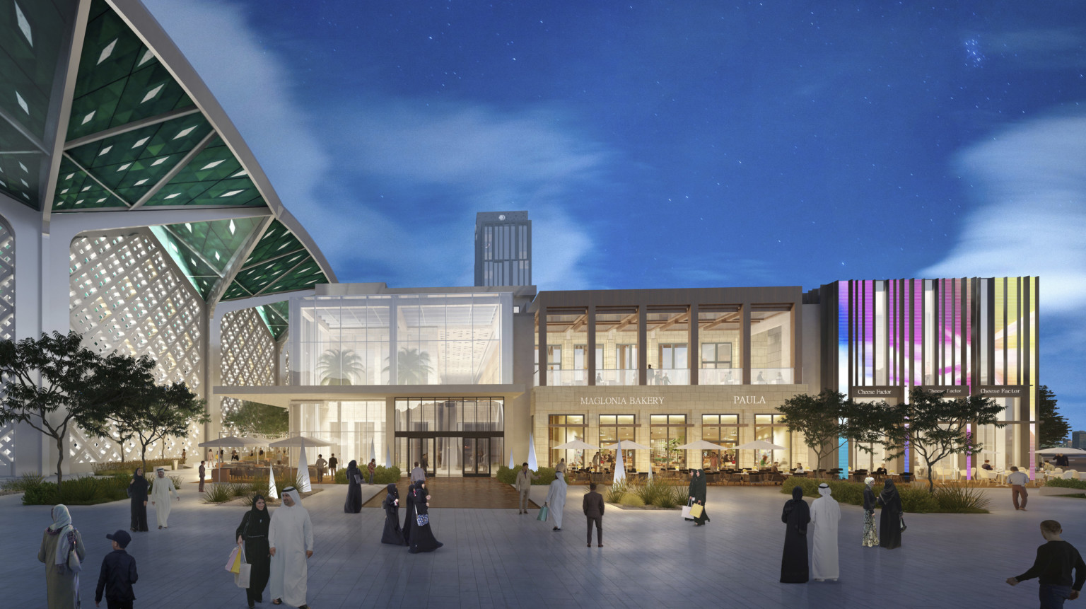 2 stone buildings with large windows. Left, white latticework topped with green geometric awning. Right, multicolor building