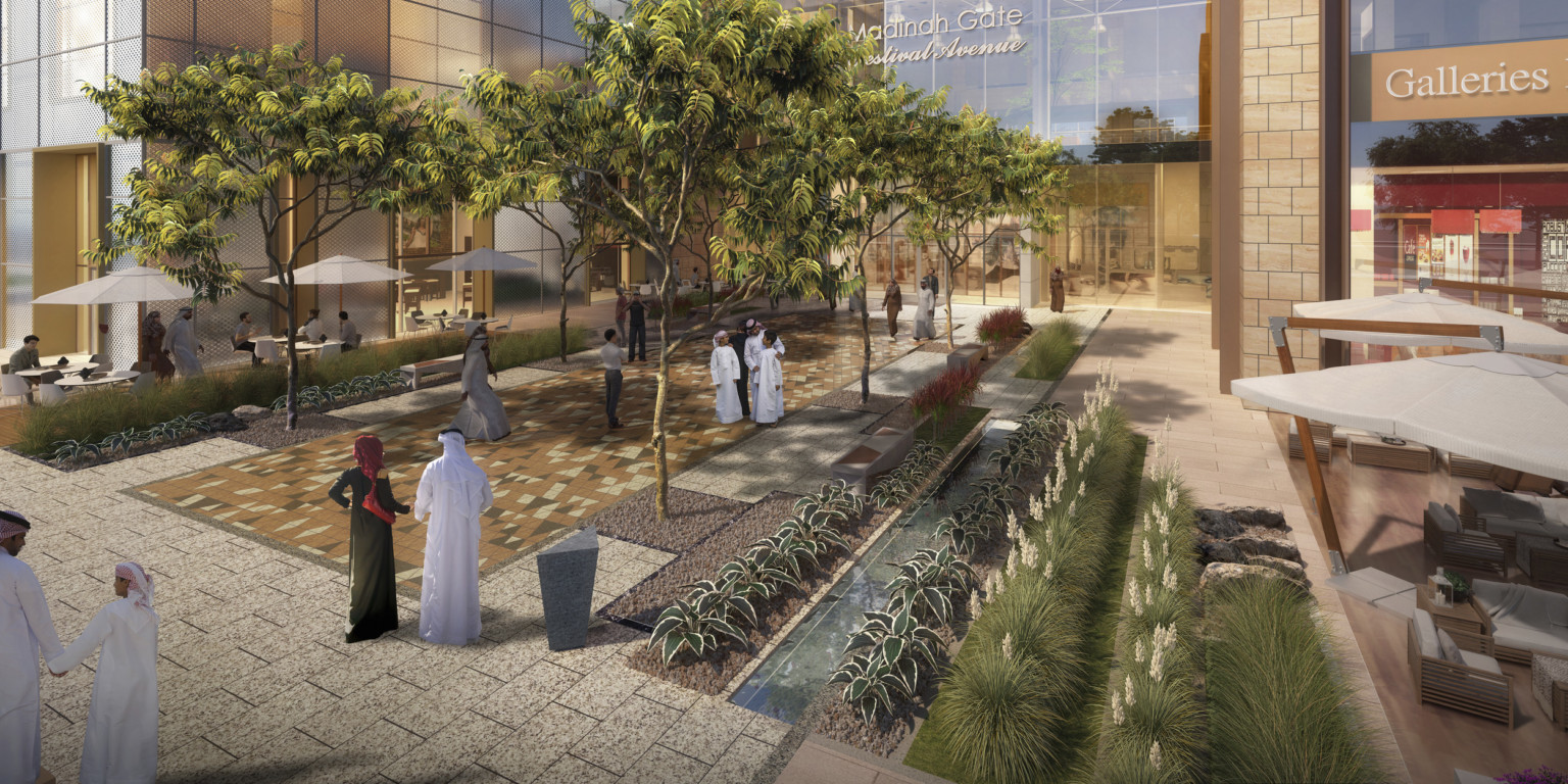 Garden courtyard with rows of plants and trees on either side of path leading to building