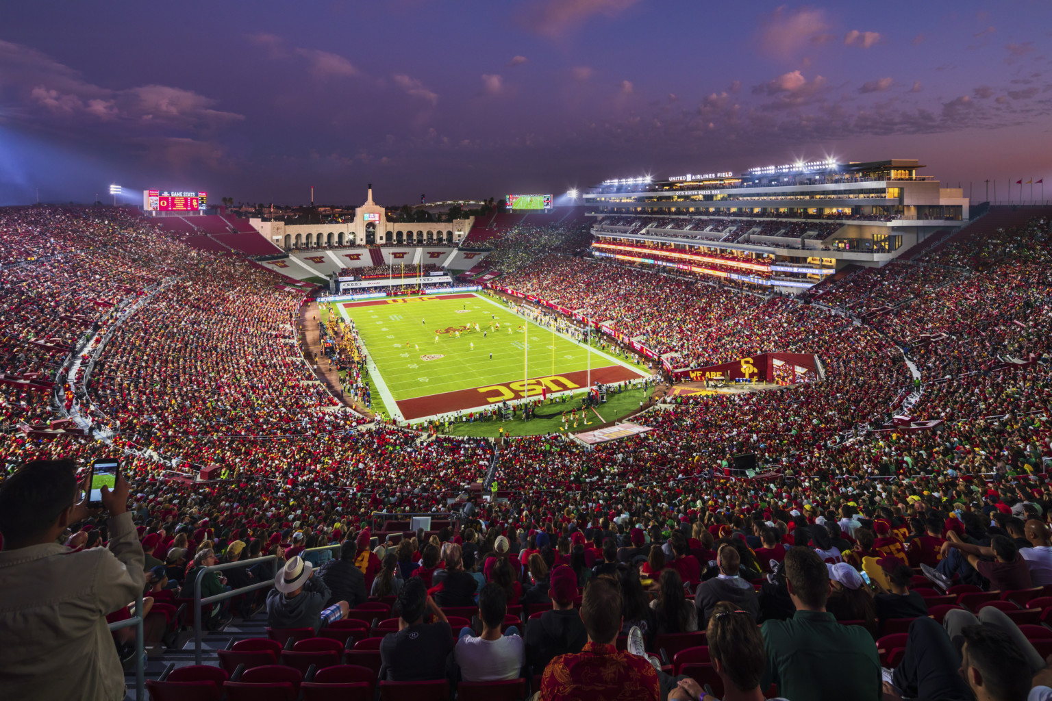 Full stadium bowl during dusk game at the LA Memorial Coliseum