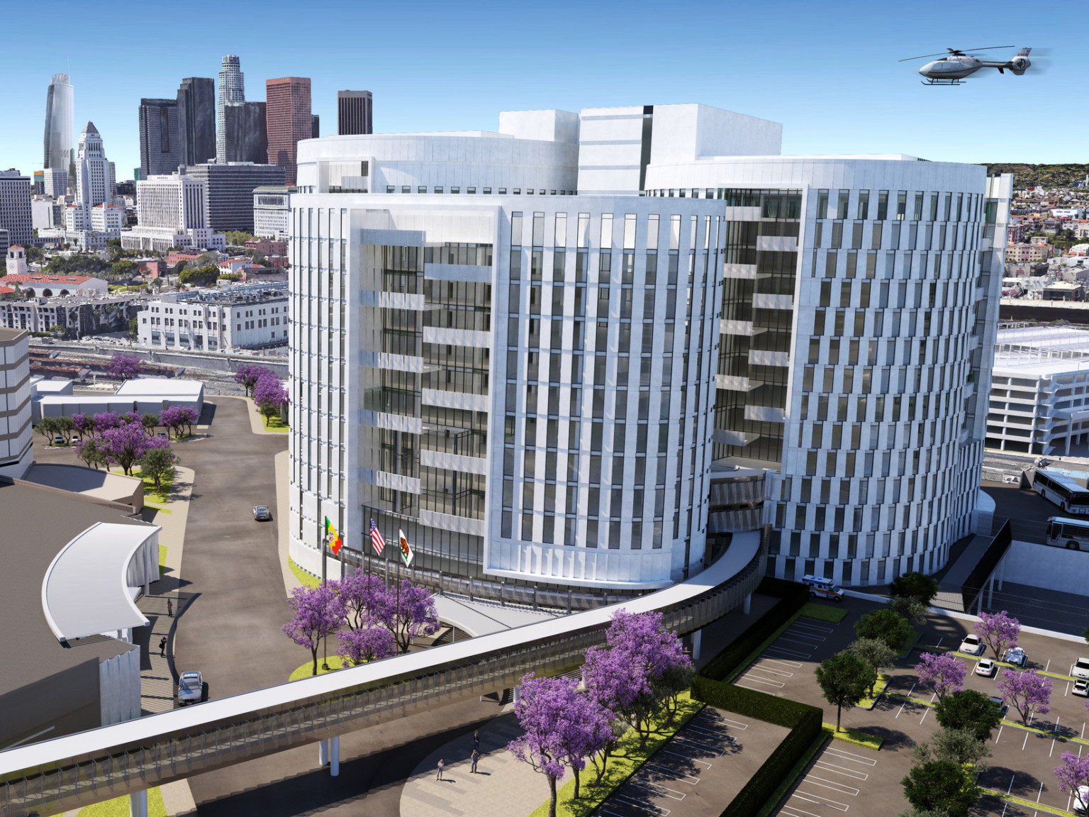 Closer view of color rendering of the white building in front of the Los Angeles skyline. A helicopter is flying to the right