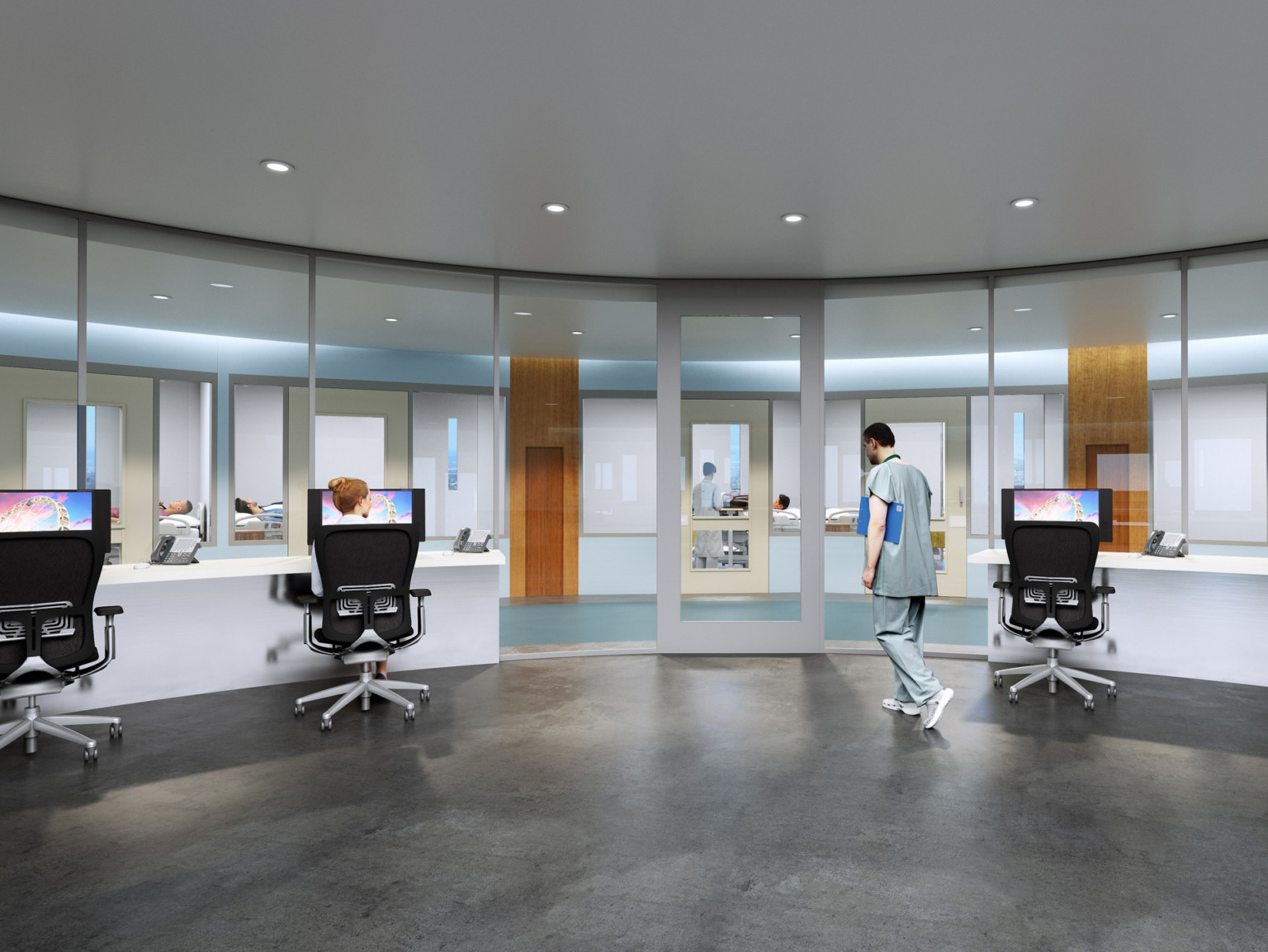 A round glass room lined with a white desk set with computers, chairs, and phones. A silver framed glass door leads to hall