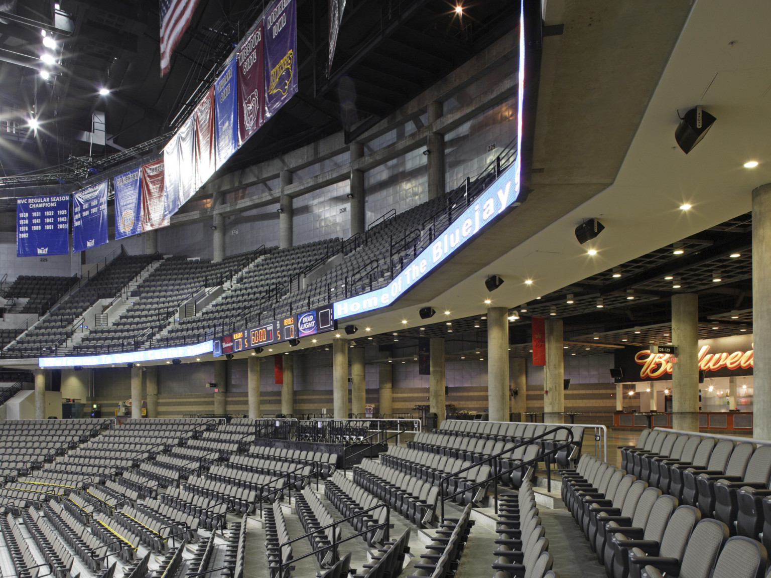 View from 1st level seats looking away from court. Banners are above LED ribbon display. Between levels are concession stands