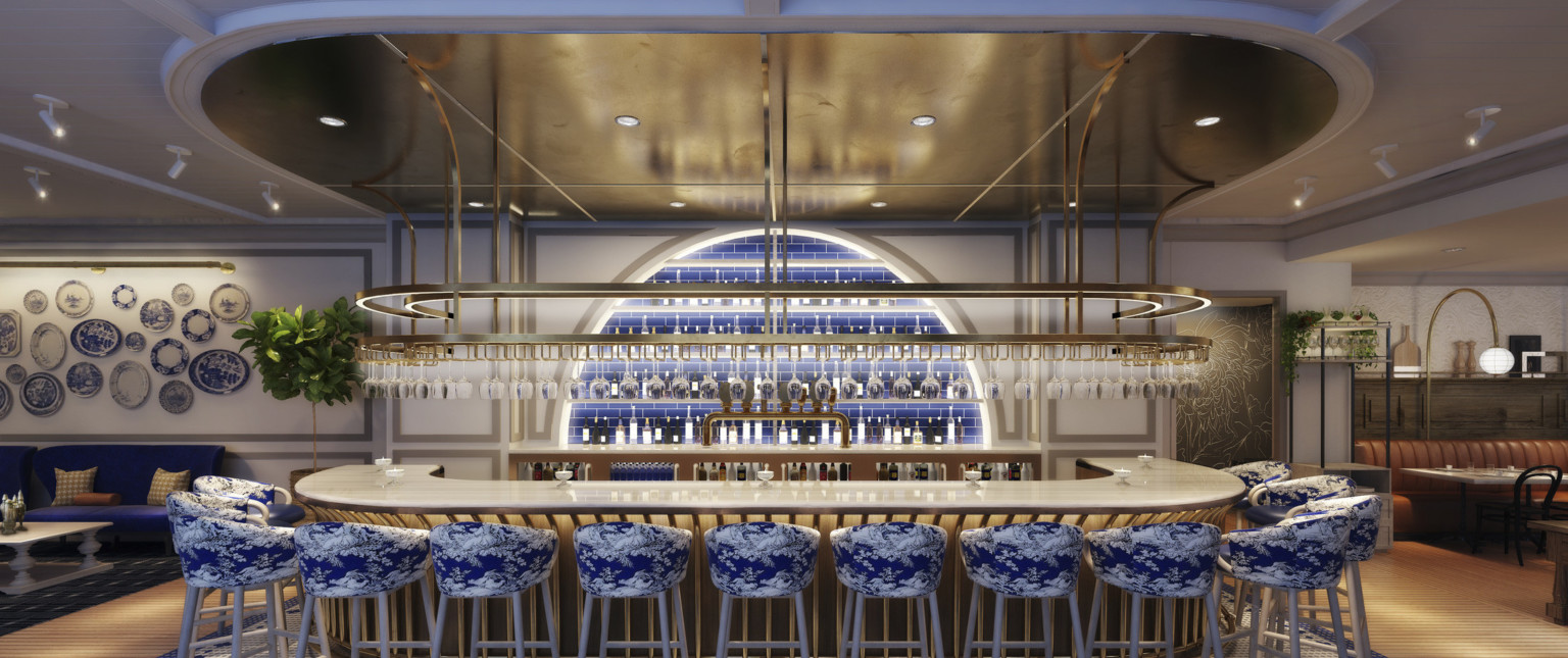 View facing bar with illuminated slat base. Arched recessed wall section with blue tile and shelves. Gold hanging glass rack