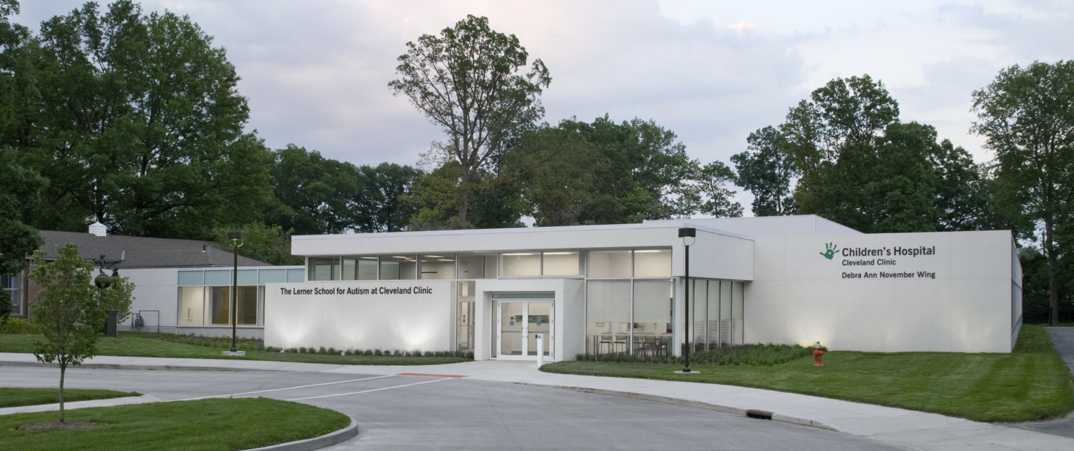 Entrance to Cleveland Clinic Lerner School for Autism, a white single story building with windows at front