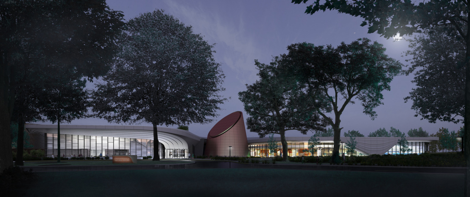 Rendering similar to first but illuminated at night so that exhibits are visible, white overhang is illuminated