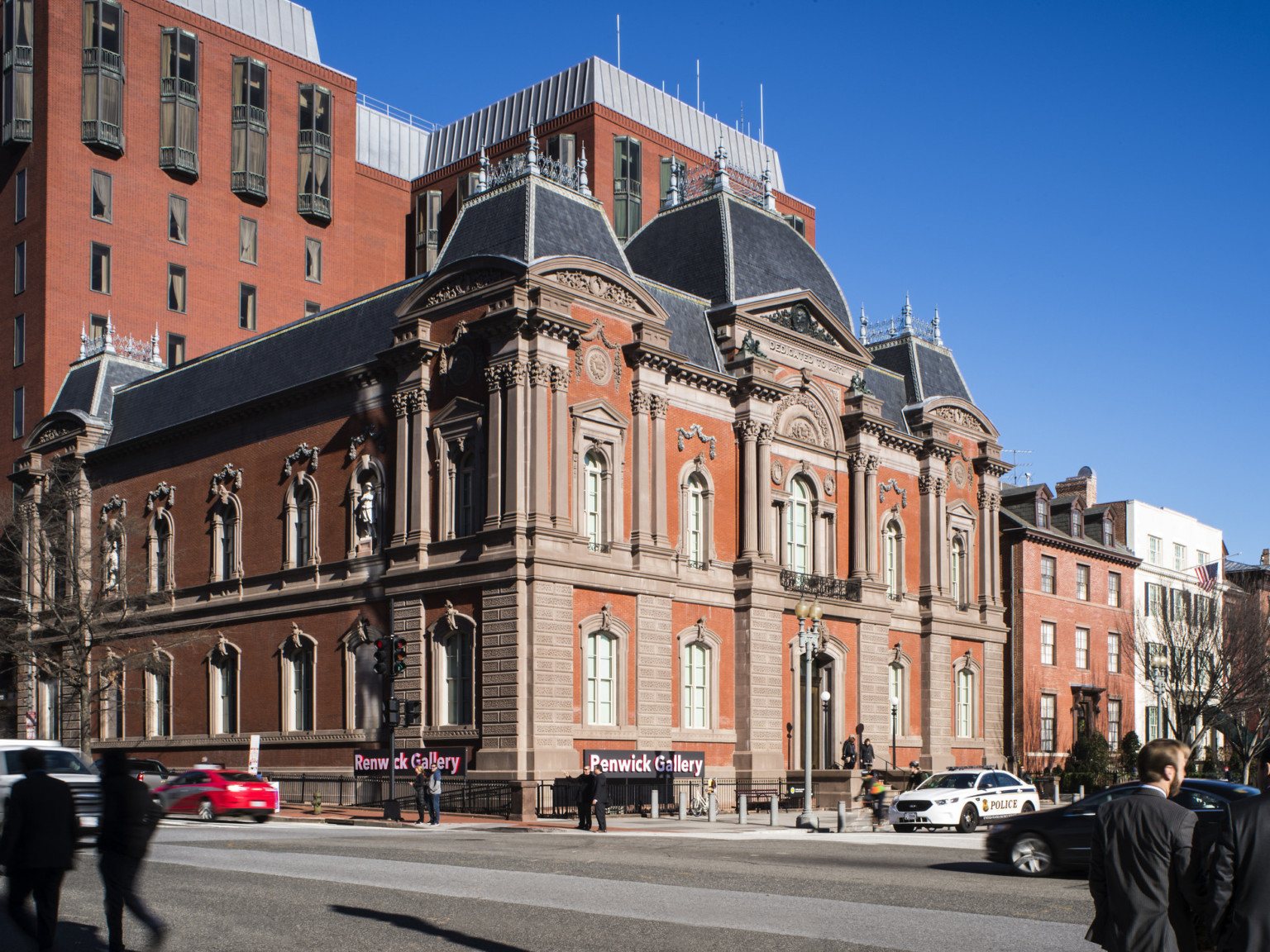 Exterior corner view of Smithsonian American Art Museum's Renwick Gallery from across a busy street