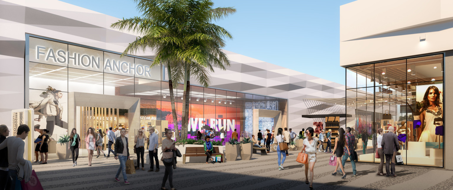 White textural storefront with double height windows behind path with palm trees, bench, kiosk. Right, lighted gold sunscreen